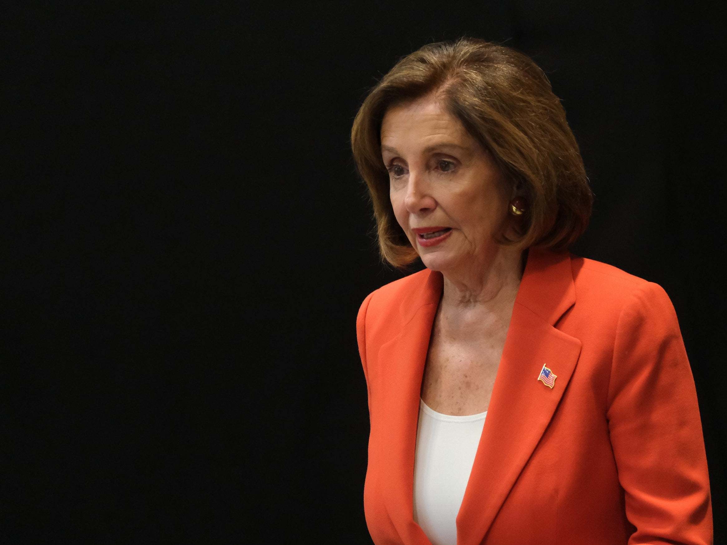 Nancy Pelosi arrives to speak to the media with a US Congressional delegation