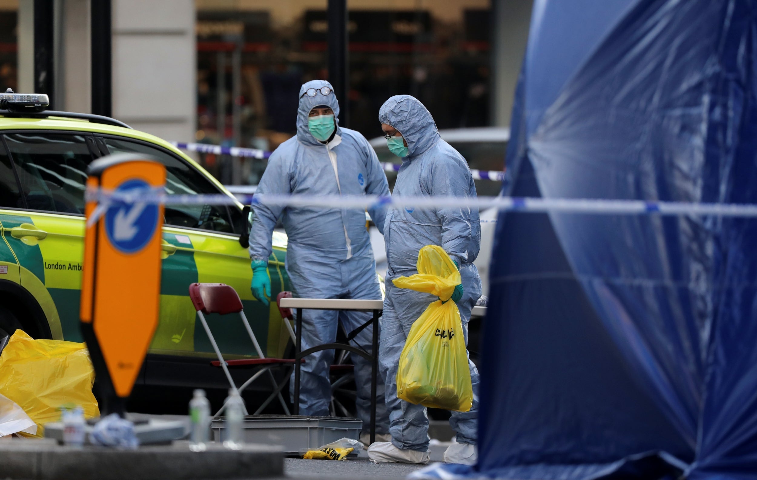 Forensic officers at work at London Bridge following the attack