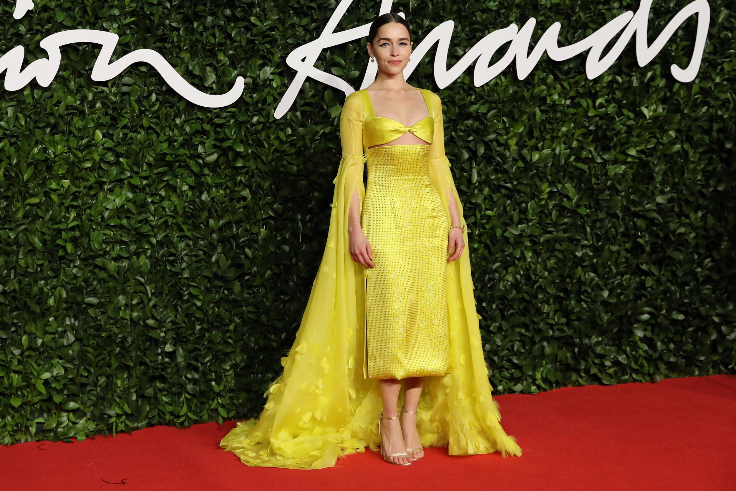 The <i>Game of Thrones</i> star looked radiant in a bright yellow creation by Italian fashion house Schiaparelli