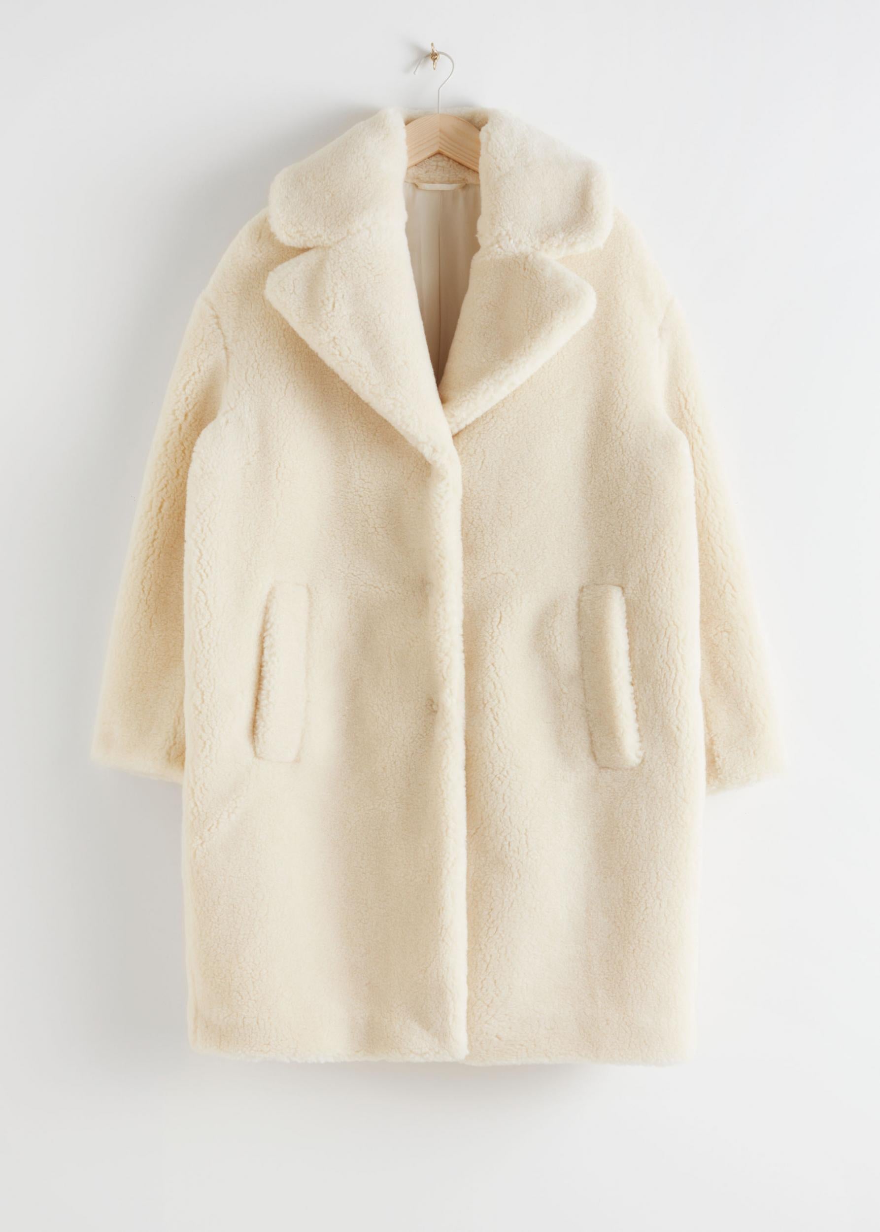 Faux Shearling Coat, £135, <a href="https://www.stories.com/en_gbp/clothing/jackets-coats/fauxfur/product.faux-shearling-coat-yellow.0657922004.html" target="_blank" rel="nofollow" class="body-gallery" data-vars-item-name="GL-9260426-https://www.stories.com/en_gbp/clothing/jackets-coats/fauxfur/product.faux-shearling-coat-yellow.0657922004.html" data-vars-event-id="c6">&amp;. Other Stories</a>