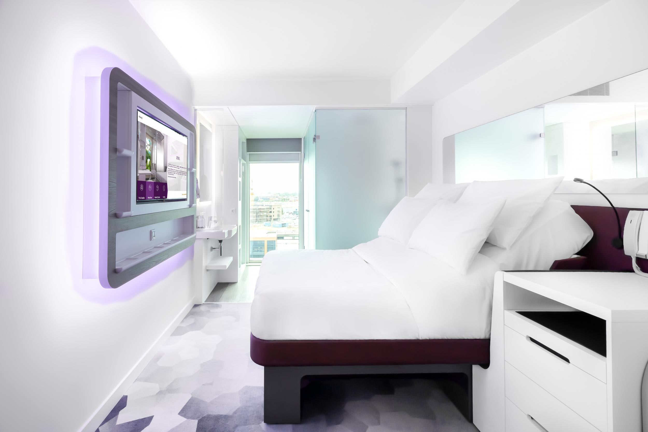 A premium queen room at Yotel