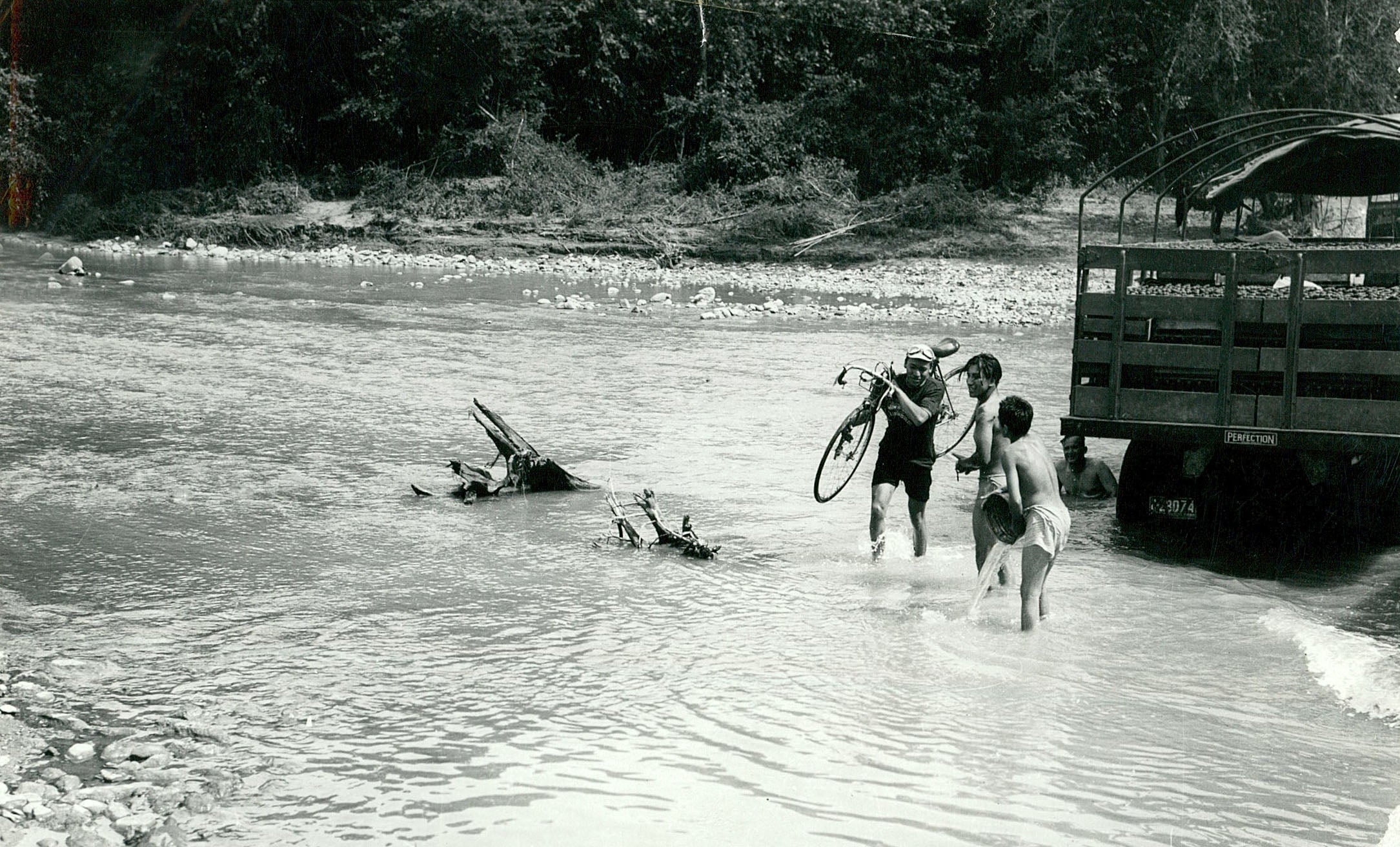 Efrain Forero fords a river during the Vuelta a Colombia