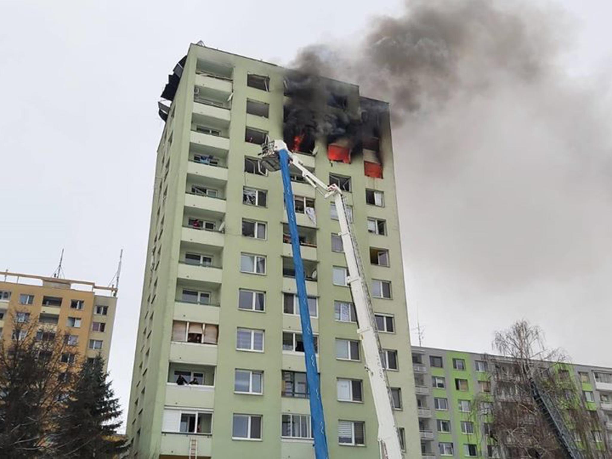 Residents have been evacuated while some people remain trapped on the roof