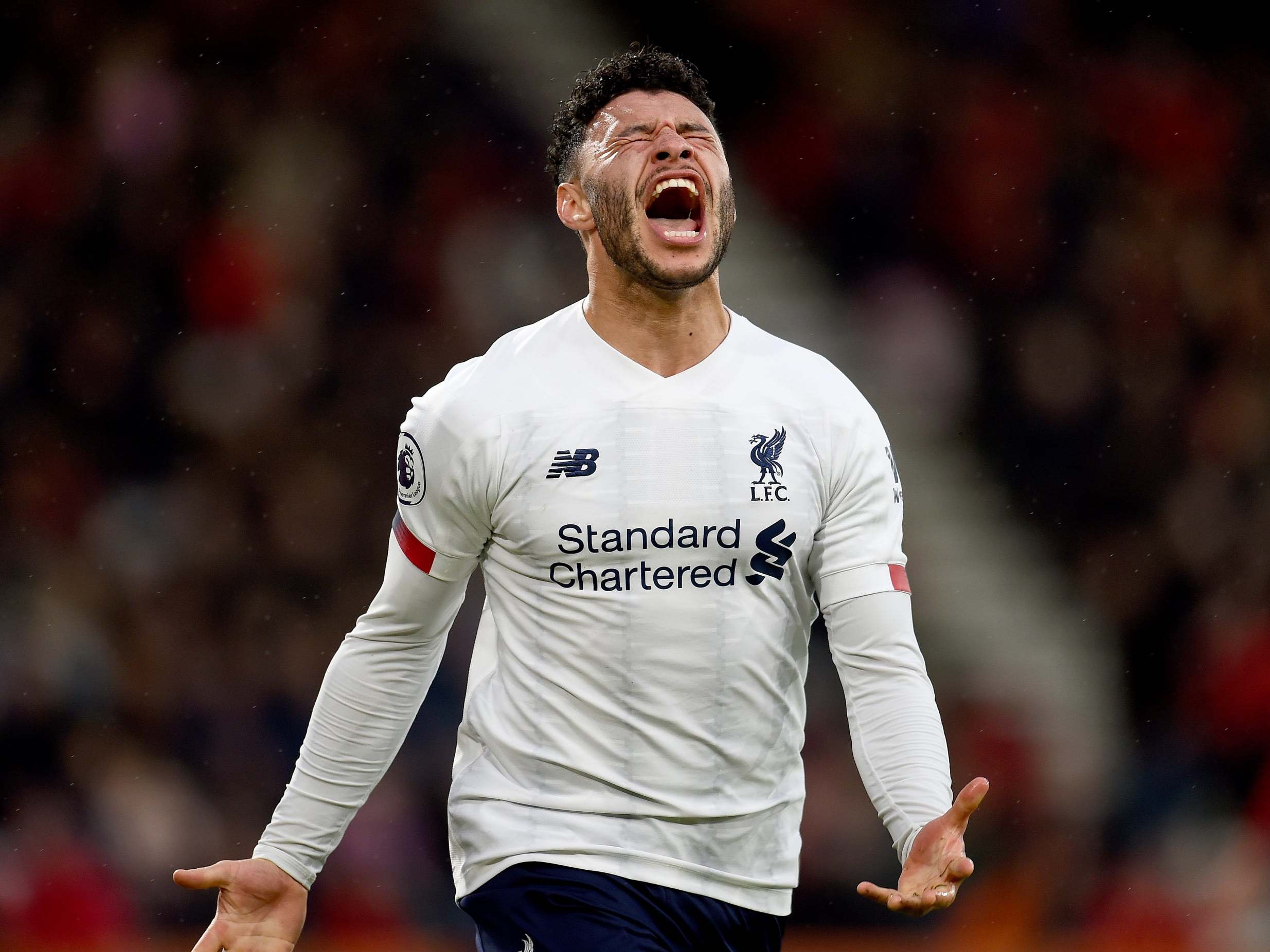 Alex Oxlade-Chamberlain celebrates scoring Liverpool's opener