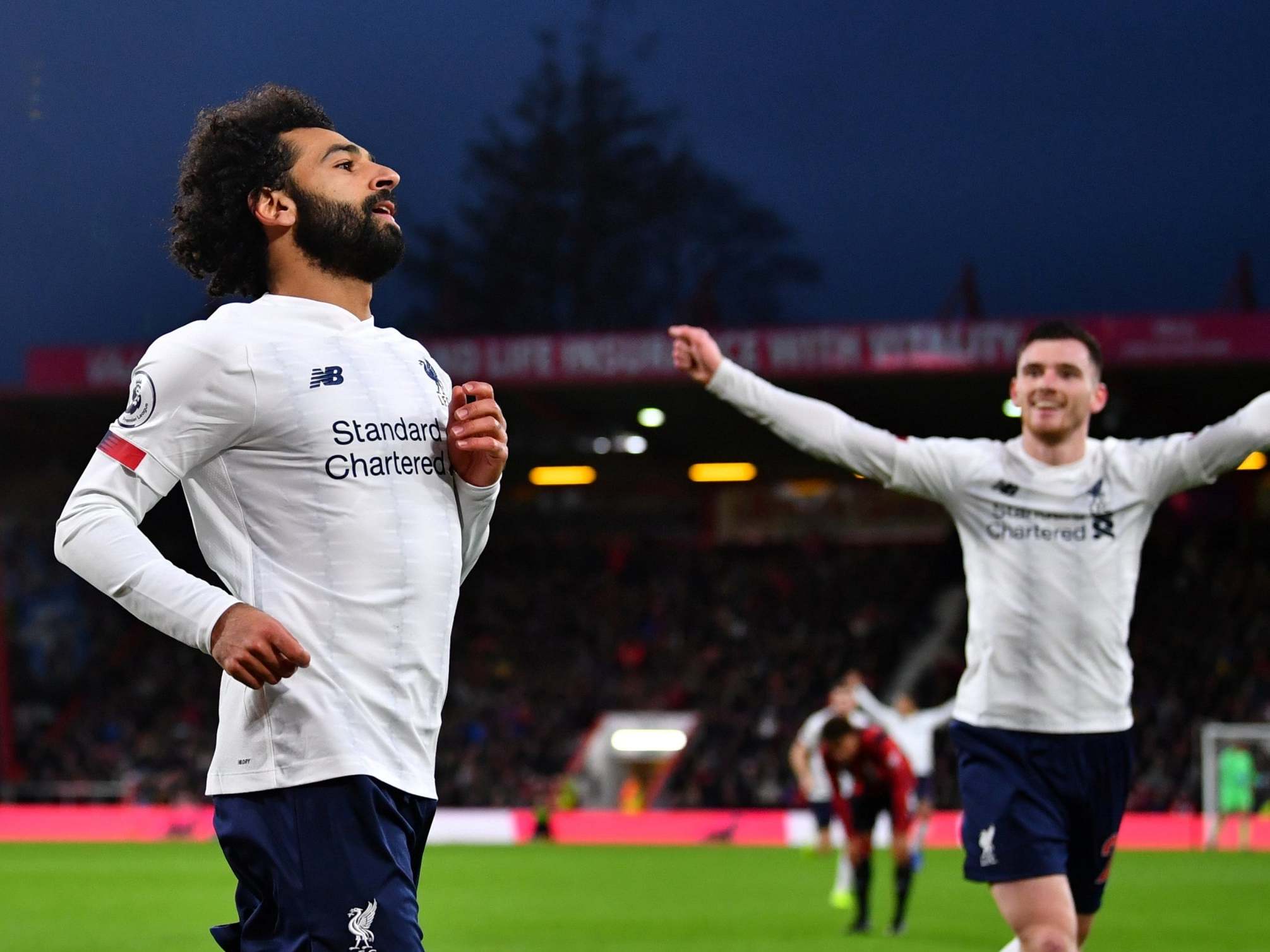 Mohamed Salah, left, scored Liverpool's third goal of the game