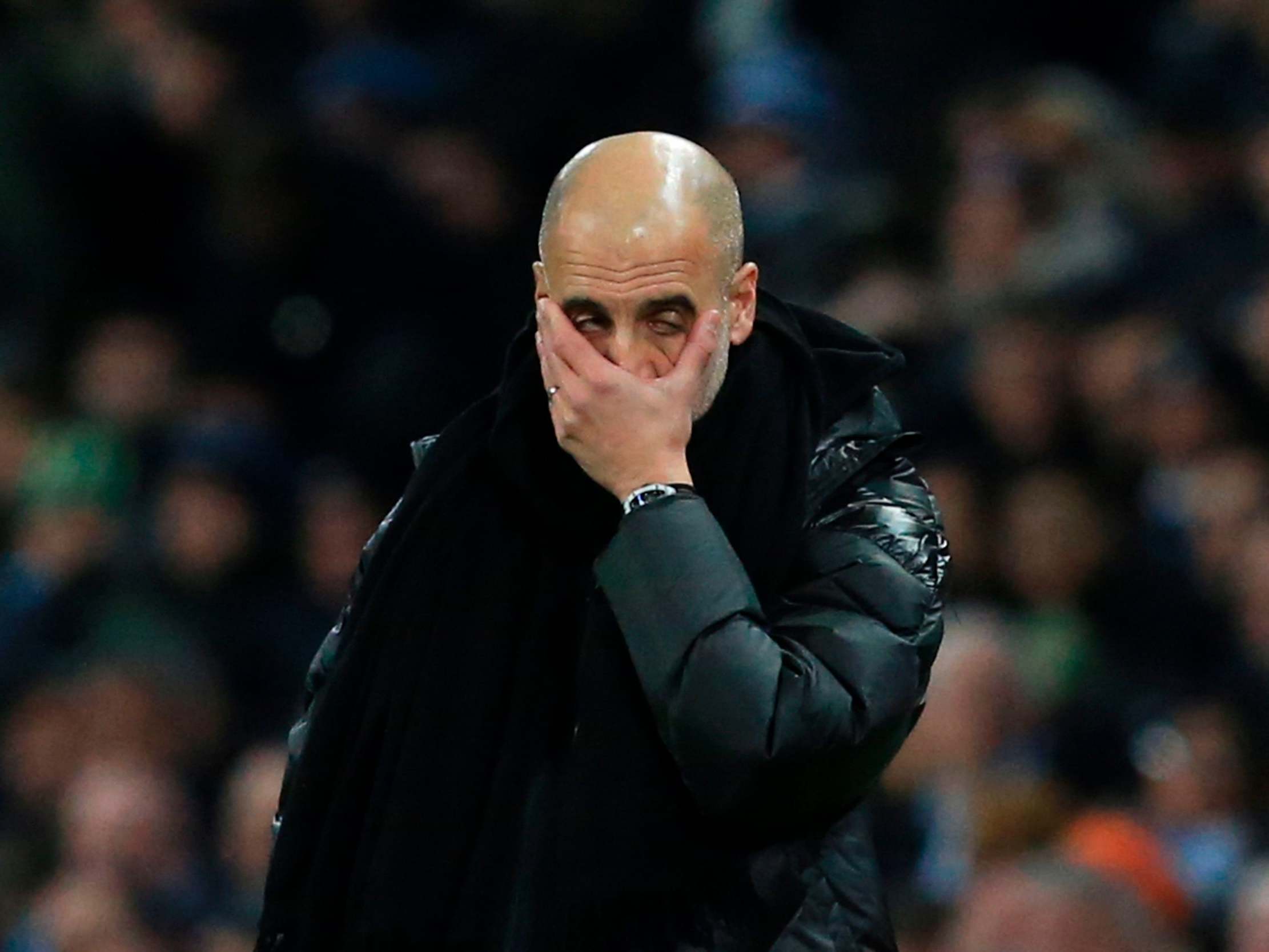 Pep Guardiola reacts to Manchester City's 2-1 defeat by rivals Manchester United