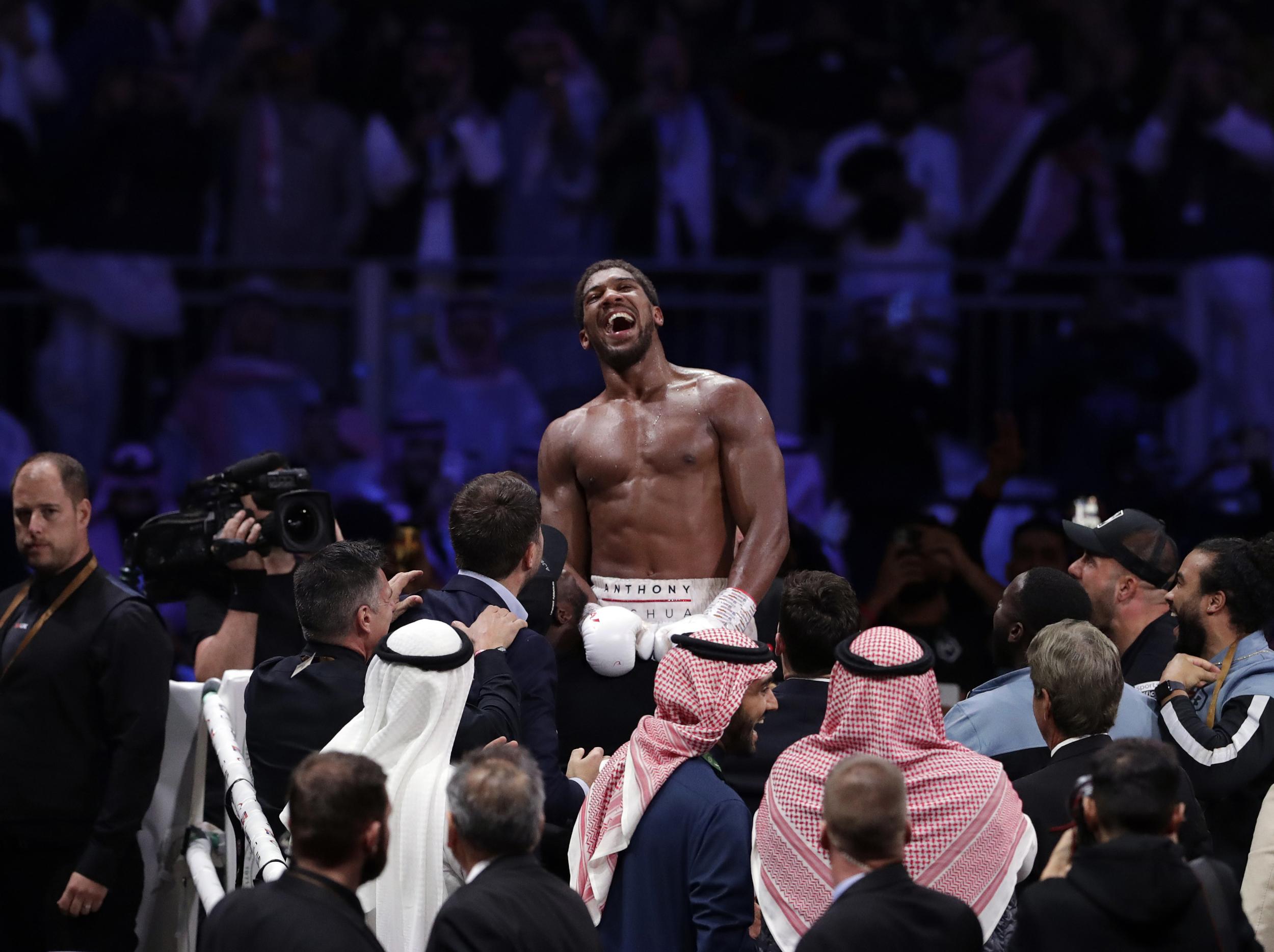 Joshua celebrates his win over Ruiz