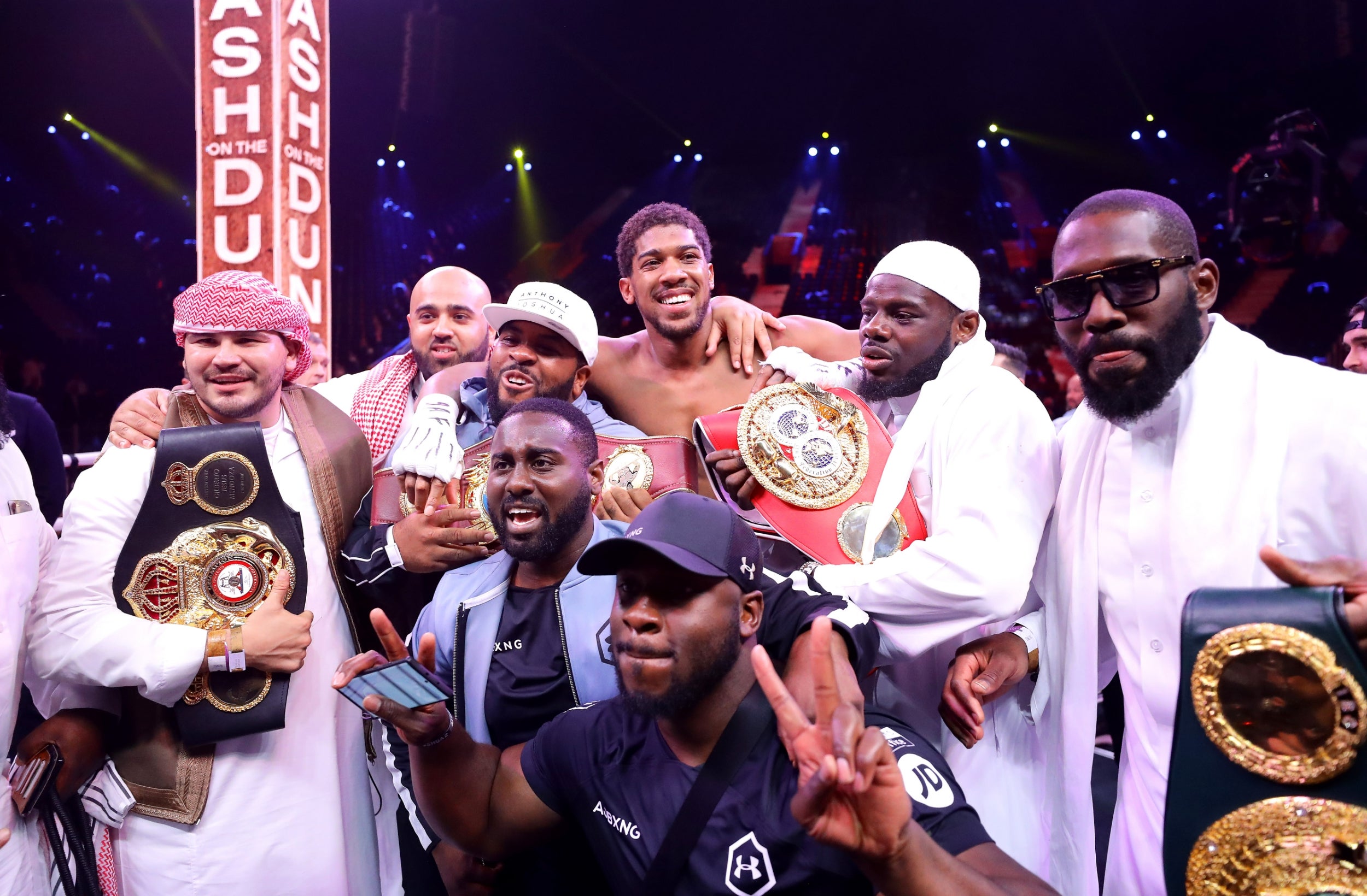 Anthony Joshua celebrates with his team after the fight (Getty)