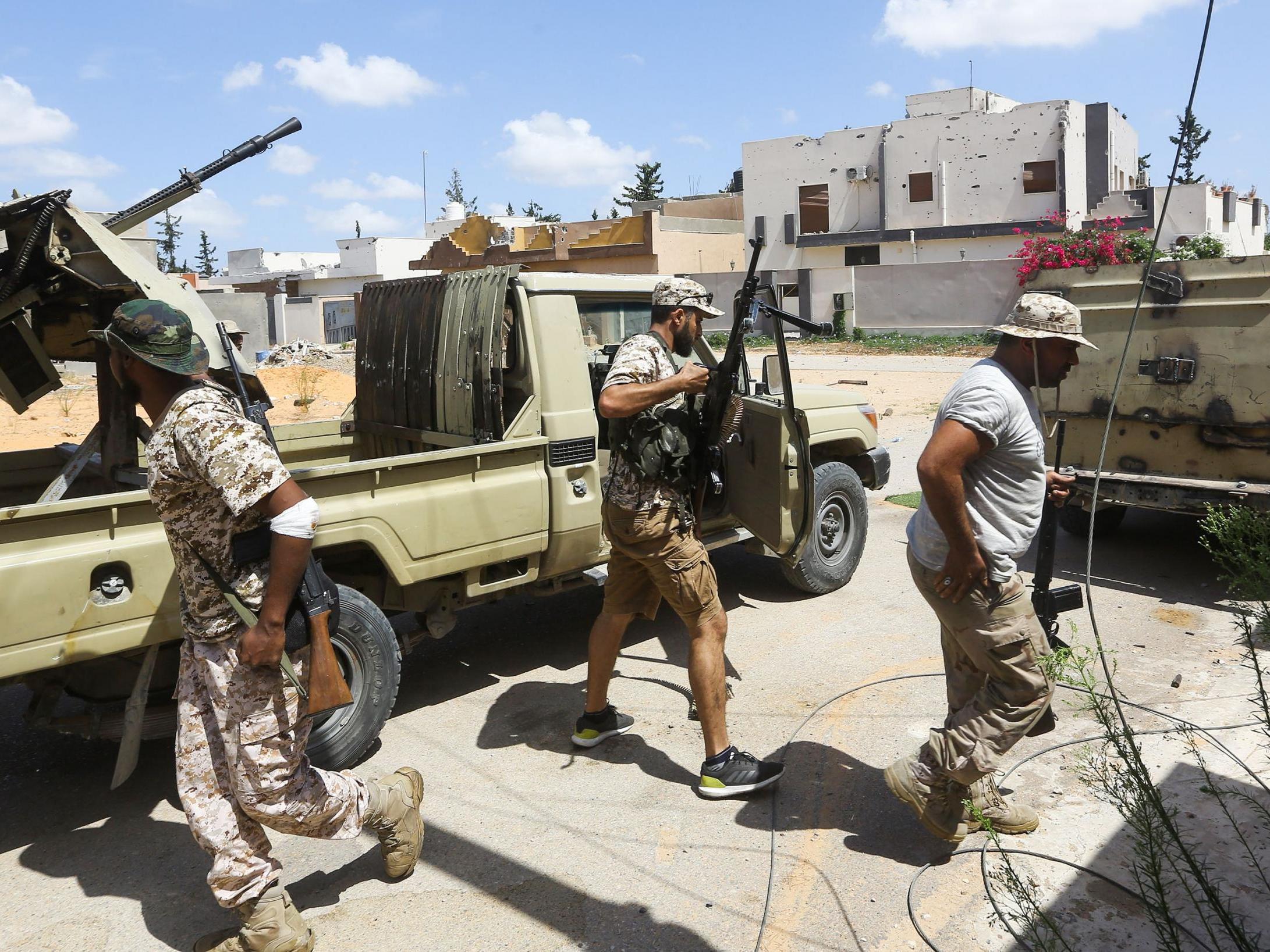 Fighters loyal to the Libyan Government of National Accord (GNA) gather during clashes with Khalifa Haftar’s forces in Tripoli’s Ain Zara suburb