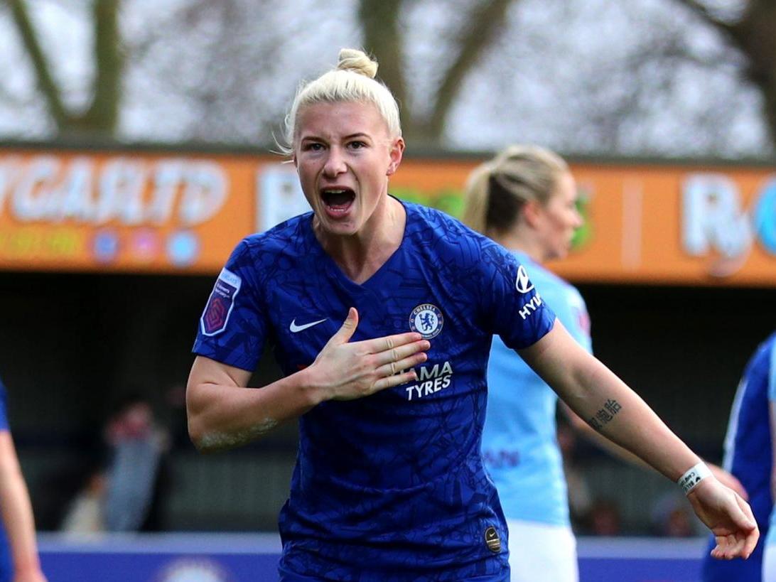 Beth England celebrates after scoring for Chelsea