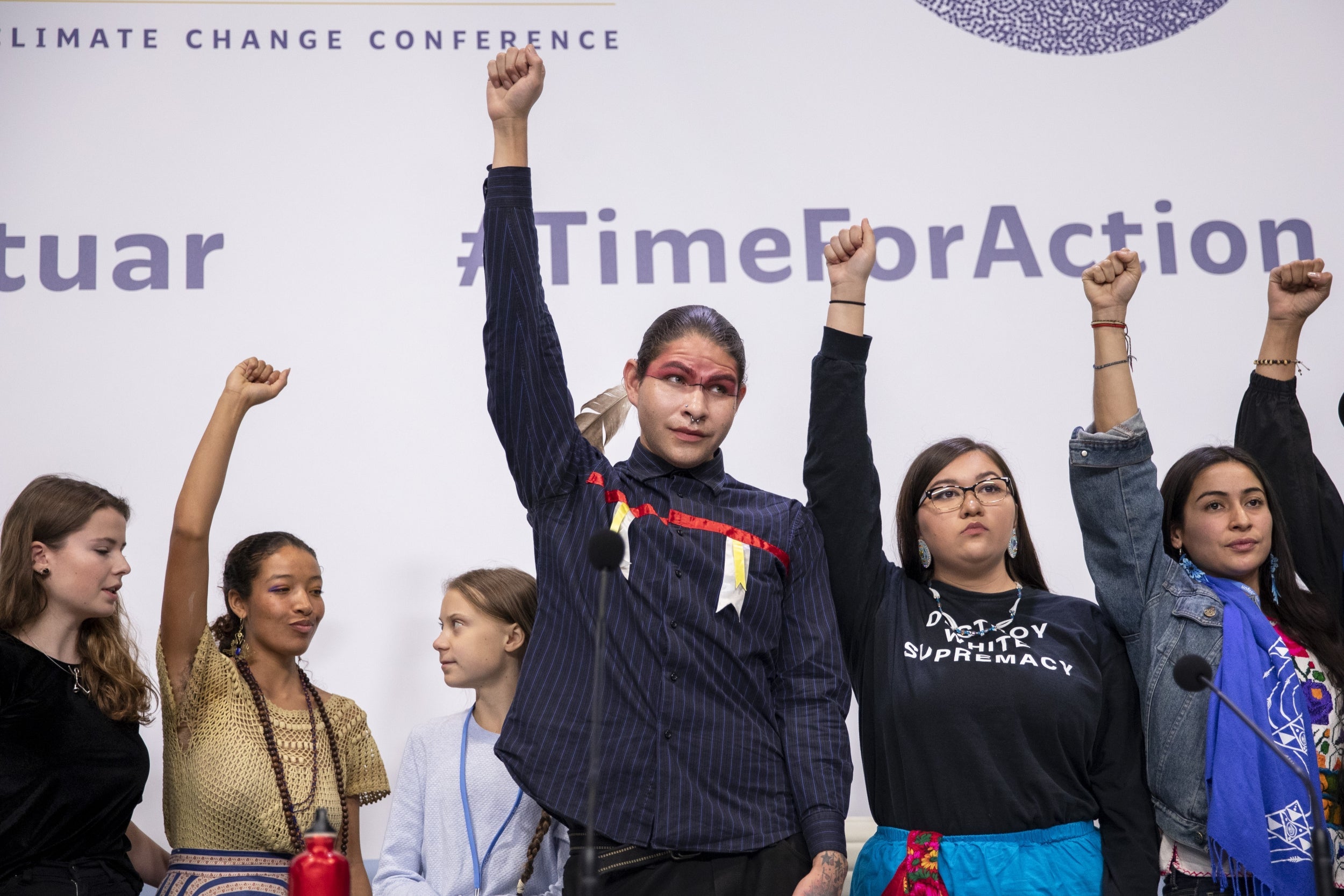 Greta Thunberg stands during a press conference with Fridays For Future movement at the COP25 Climate Conference on Monday