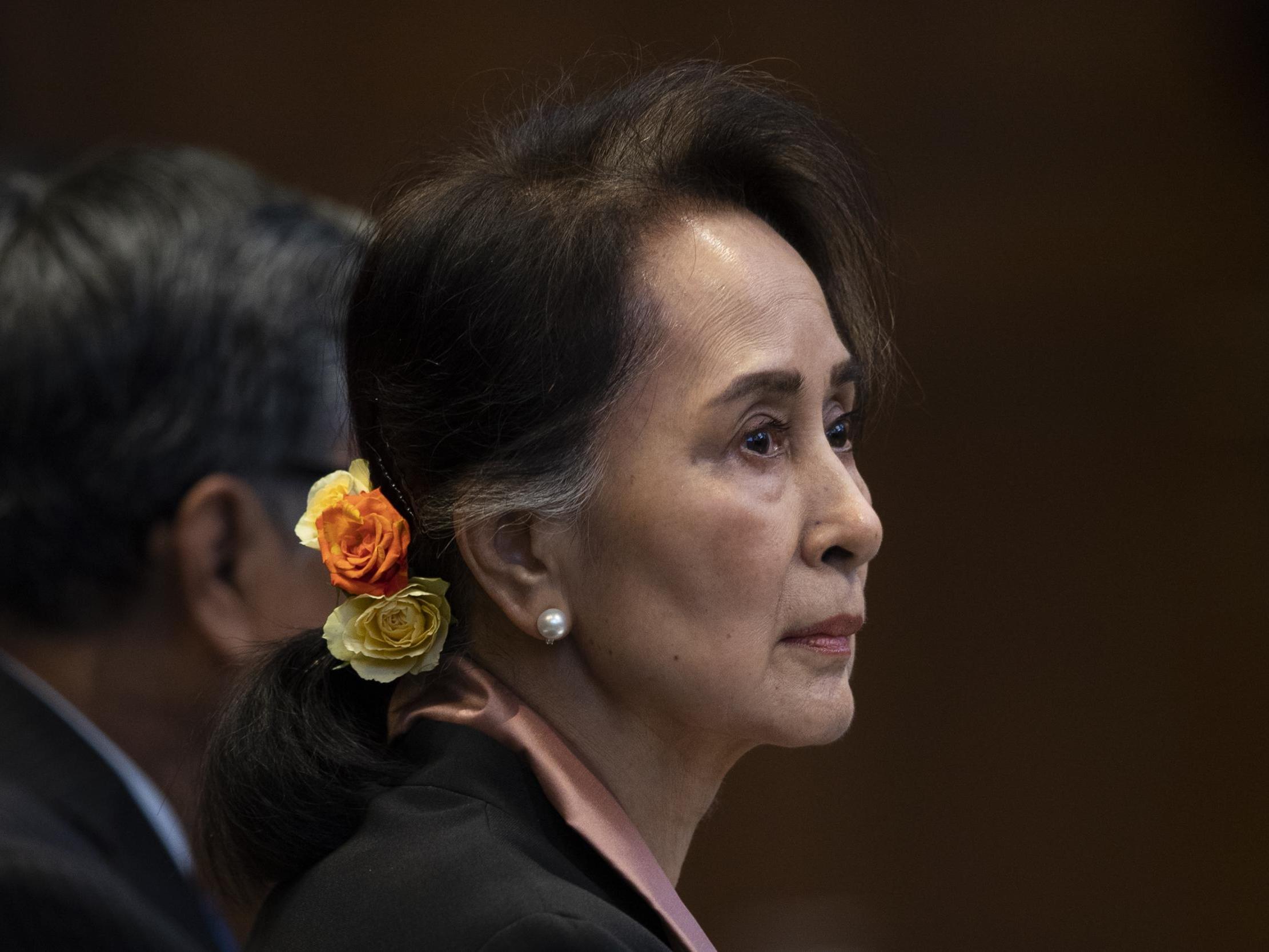 Aung San Suu Kyi appears in court over Myanmar genocide charges