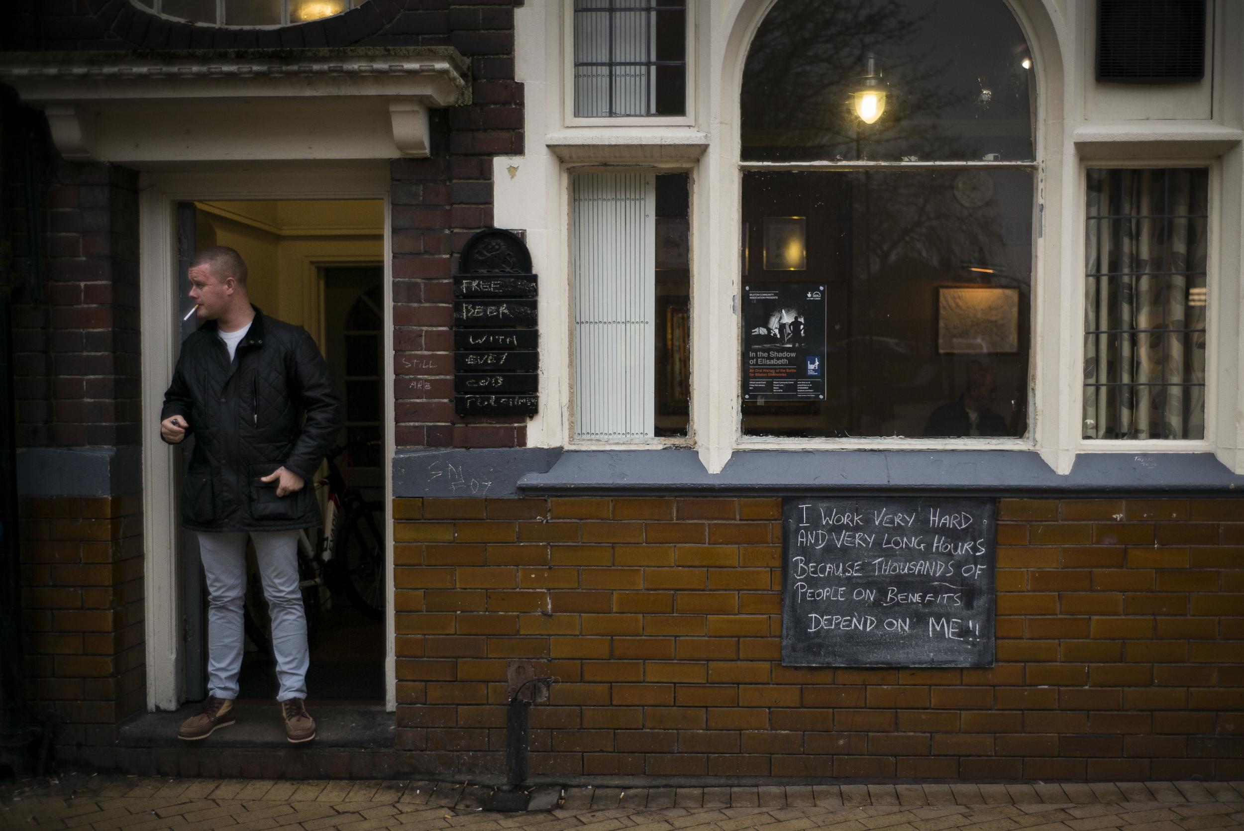 The smoking ban in public places has had a big impact on pubs, with smokers more likely to buy their drink to consume at home (Getty)