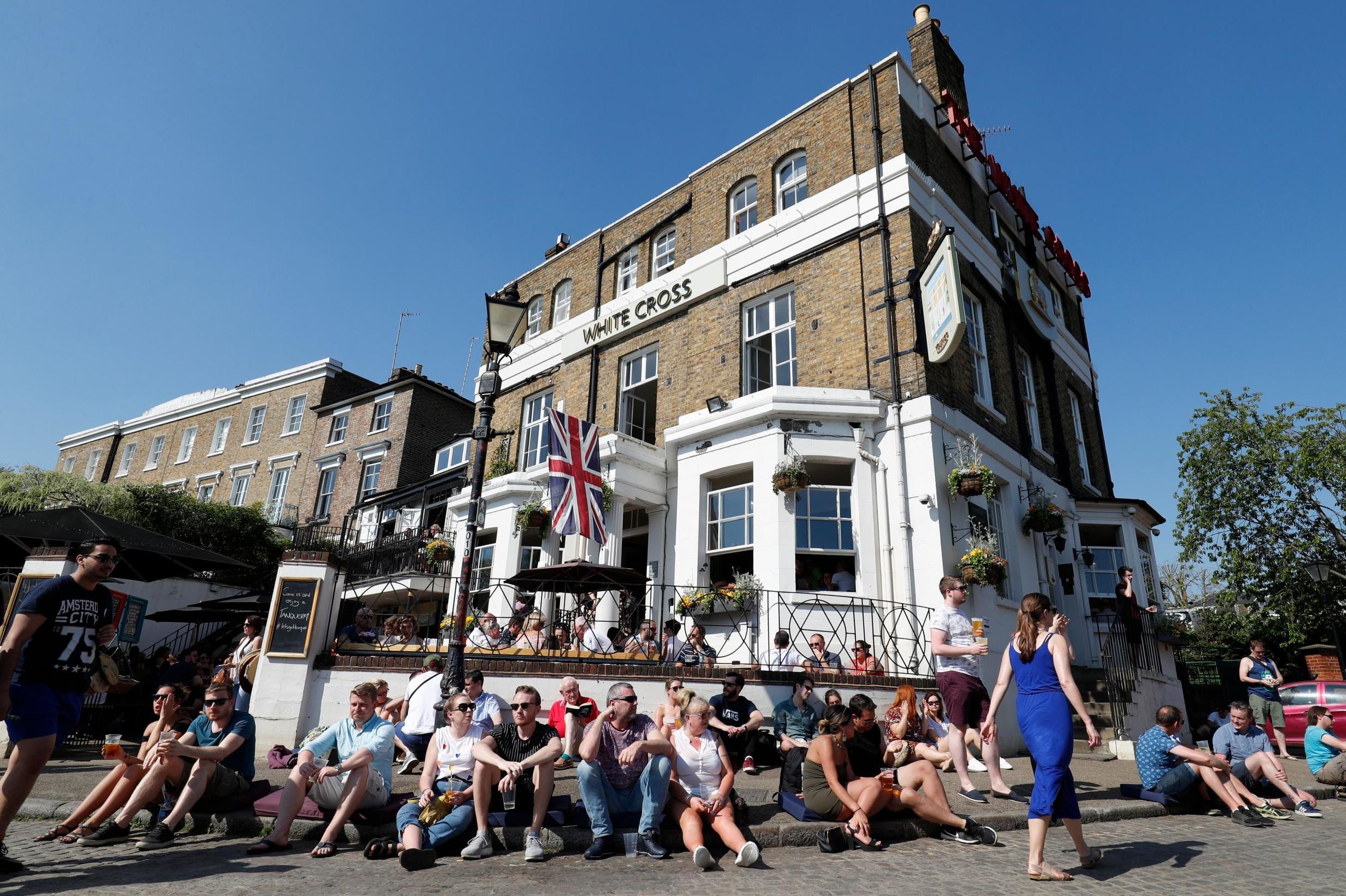 Recent hot weather helped riverside and garden pubs turn a healthy profit in summer (AFP/Getty)