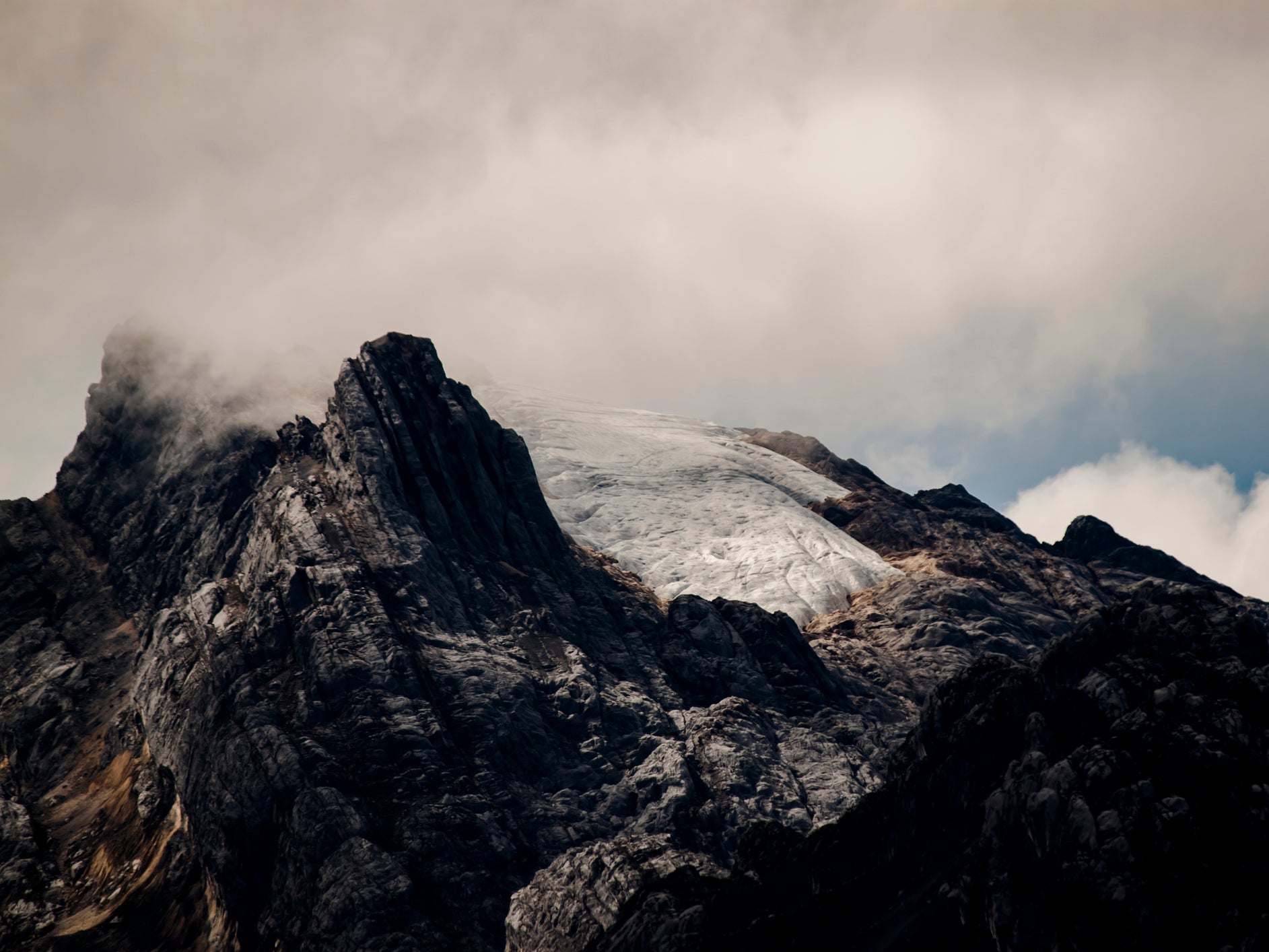 The spectacular mountain Puncak Jaya and the shrinking Carstenz glacier in Mimika Regency, Papua, Indonesia