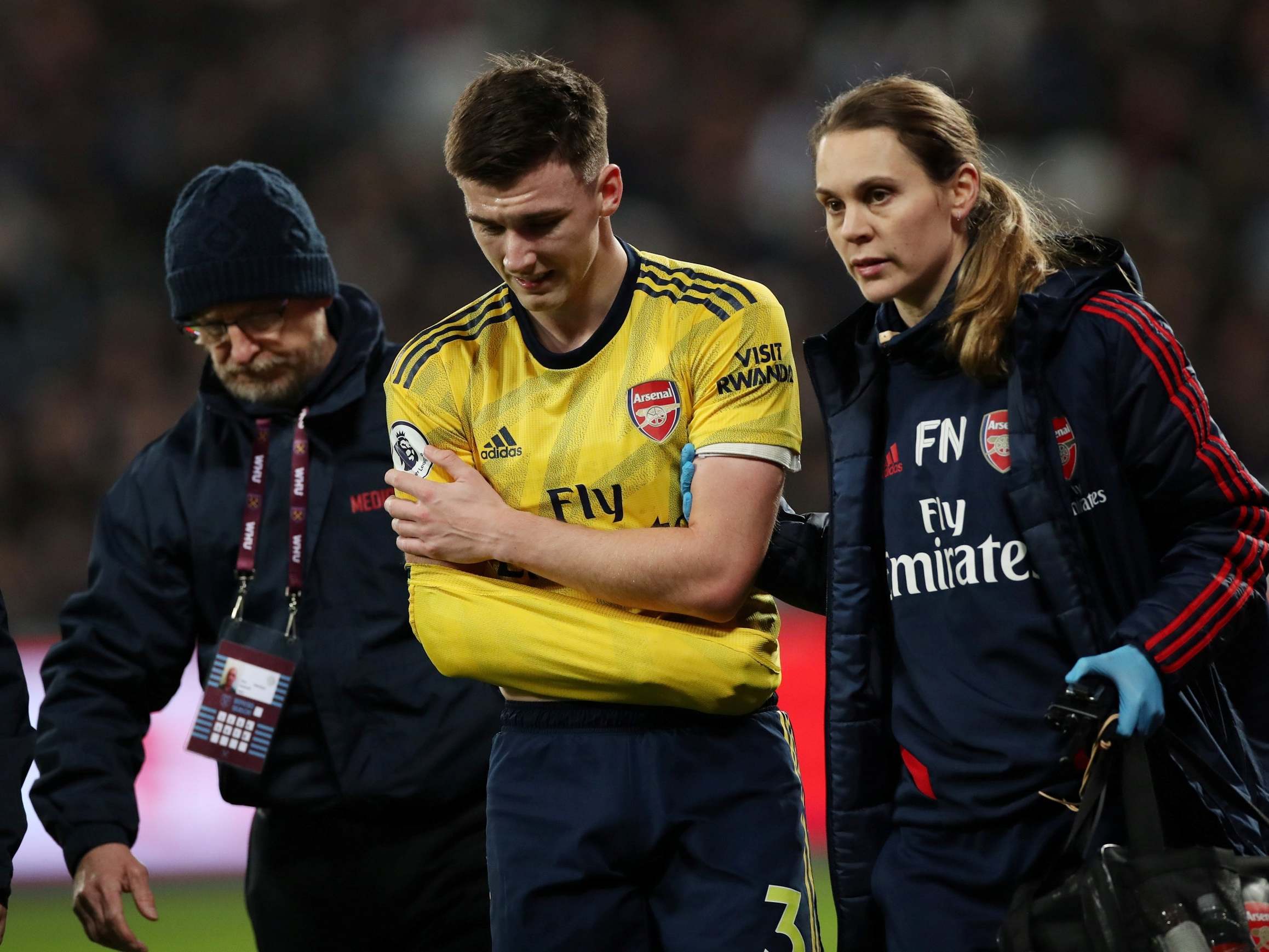 Arsenal's Kieran Tierney is substituted after sustaining a shoulder injury