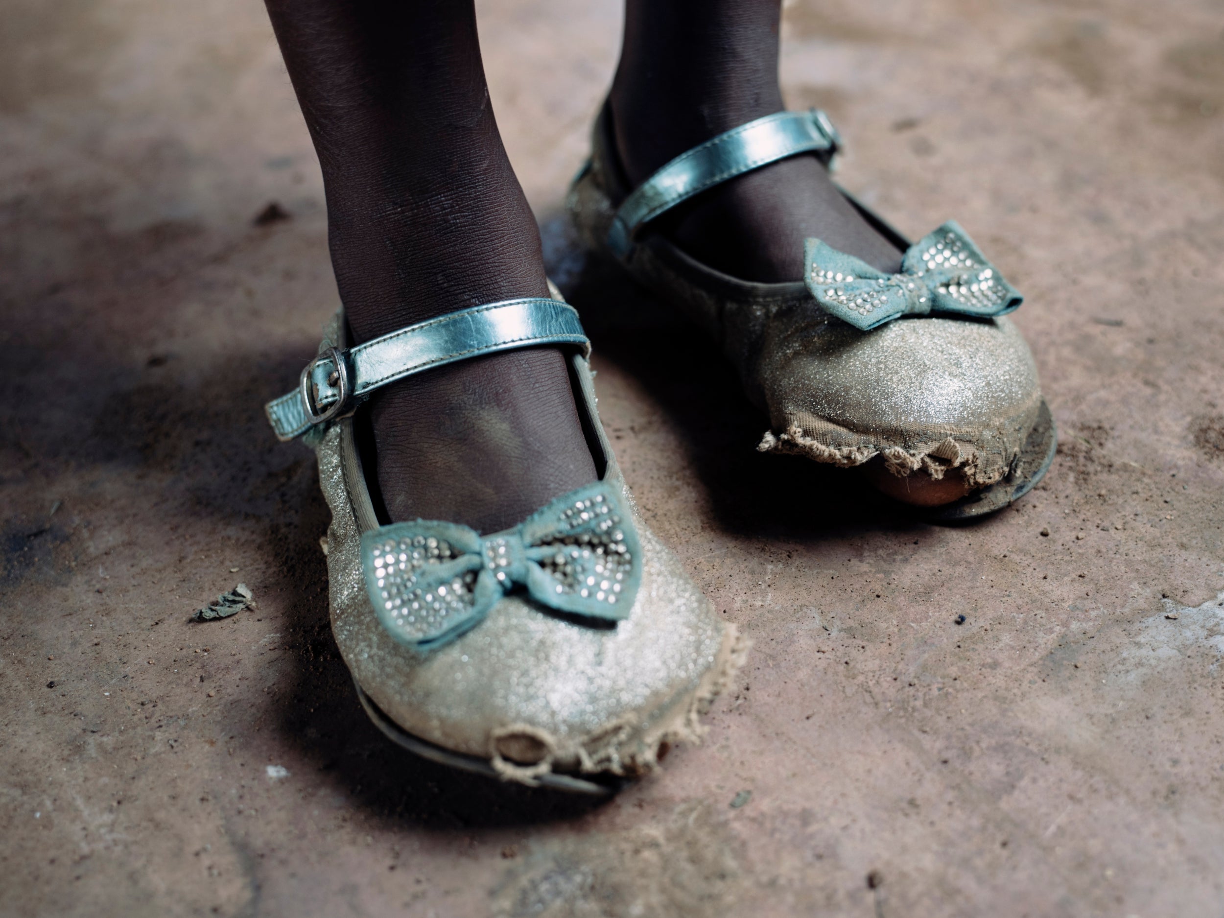 Today poverty remains one of the greatest barriers to enrolment in education and no better example of this can be illustrated than in rural and remote parts of Tanzania. A majority of children in Tanzania do not attend school due to informal fees or voluntary parental contributions required for enrolment. This includes among other things, the compulsory purchase of shoes. Foundations like TOMS have given 95 million pairs of shoes to people across 82 countries.