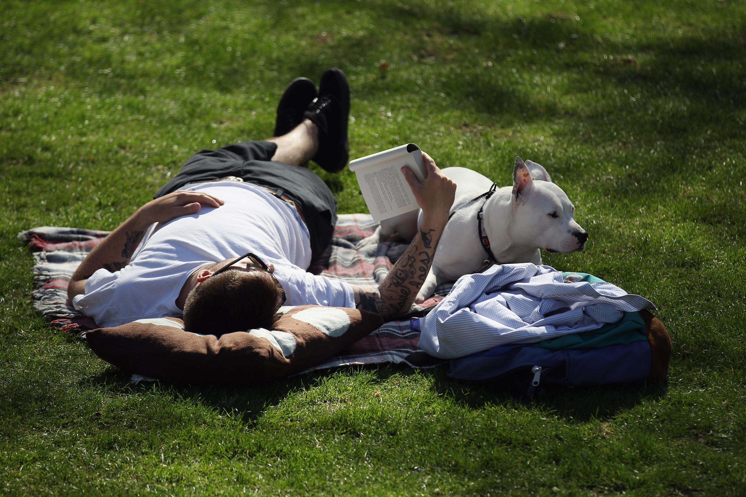 Working less also enables us to experience the joys of doing nothing in particular (Getty)