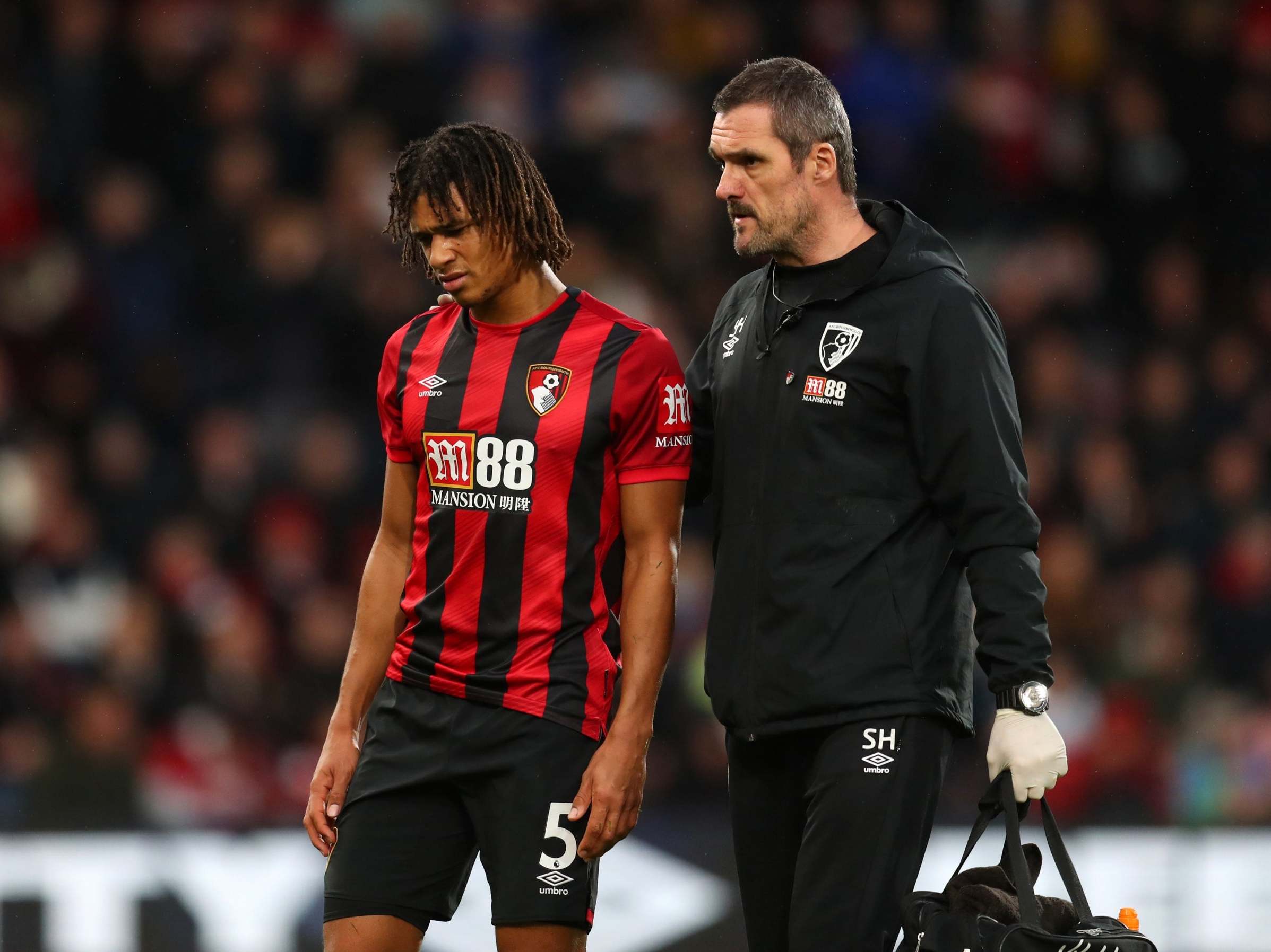 An injured Nathan Ake of Bournemouth