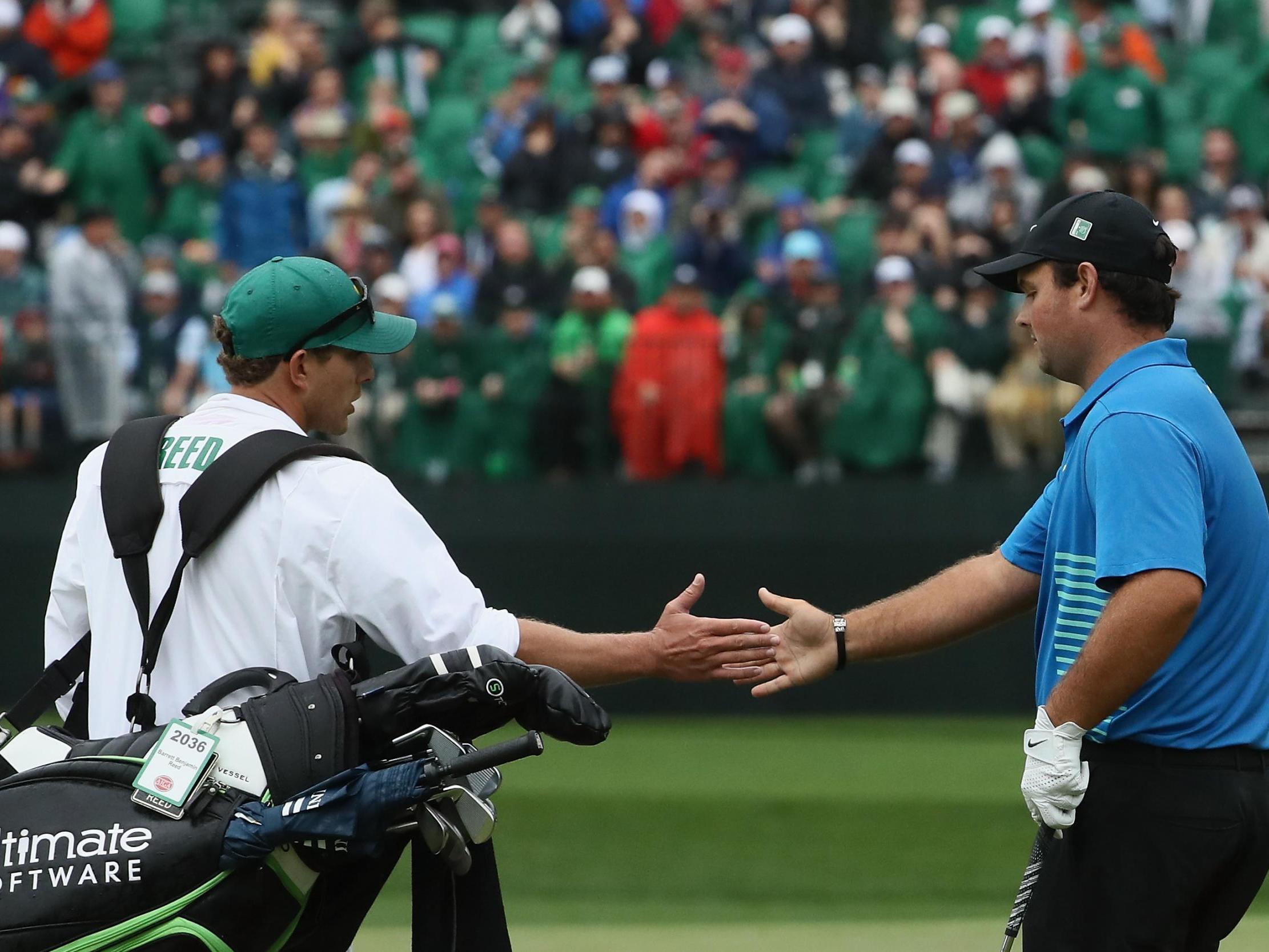 Patrick Reed with caddie Kessler Karain at the 2018 Masters