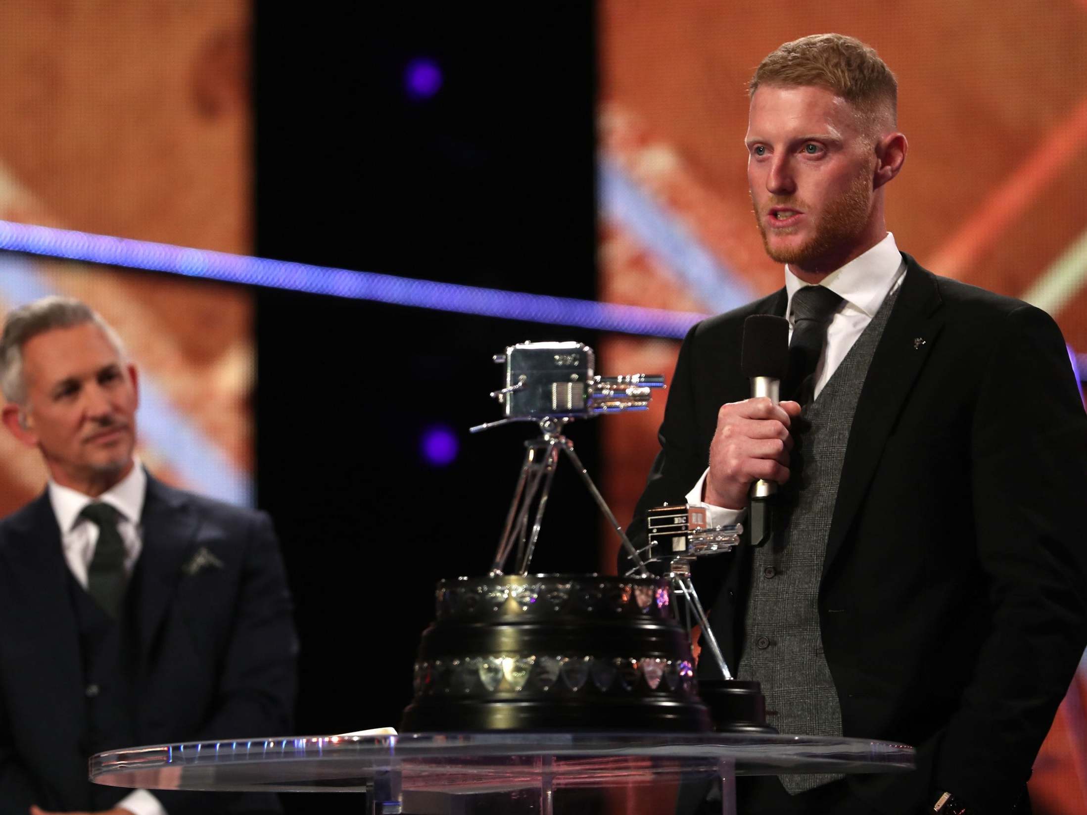 Ben Stokes makes a speech as presenter Gary Lineker looks on