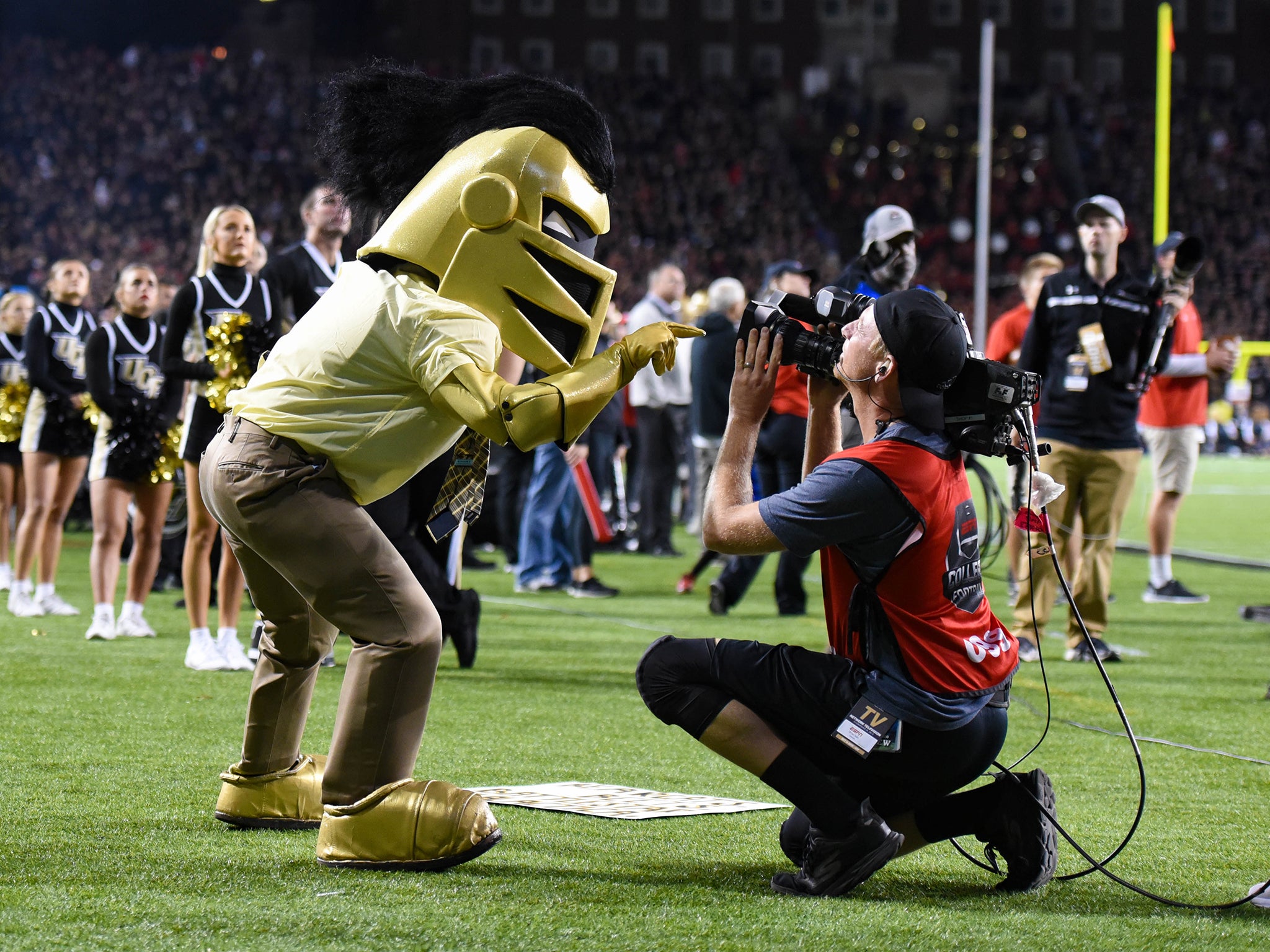 Knightro, the University of Central Florida mascot, puts on a show for the cameras