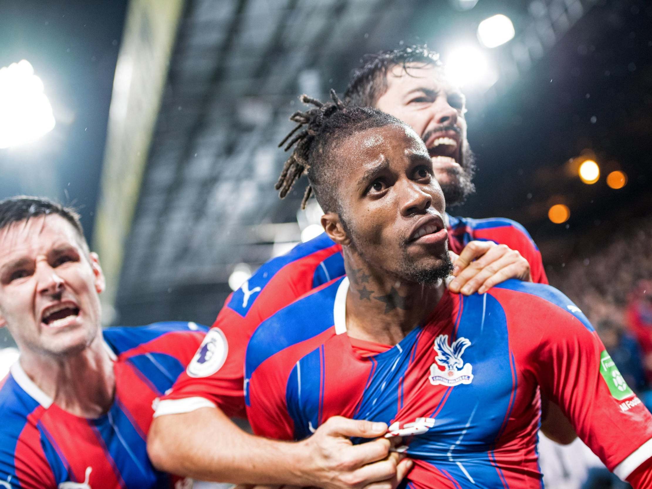 Wilfried Zaha celebrates scoring against Brighton