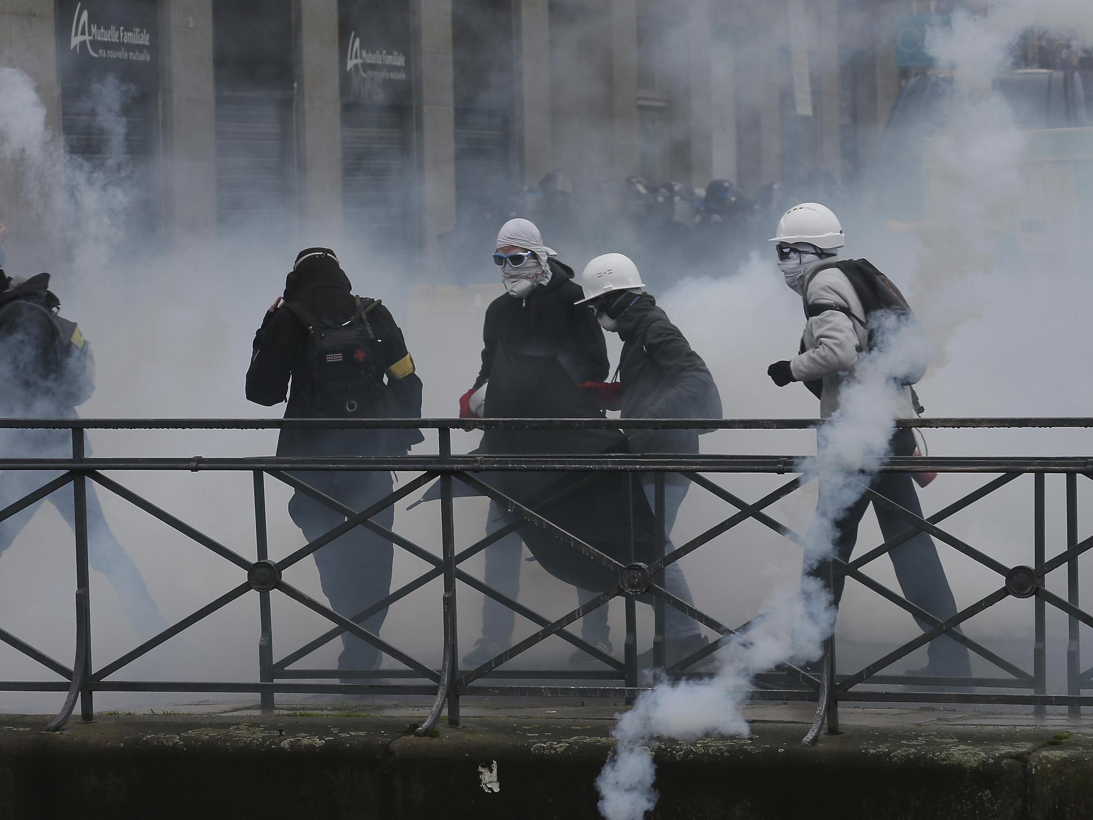 Protesters clash with police during a protest in Rennes, western France