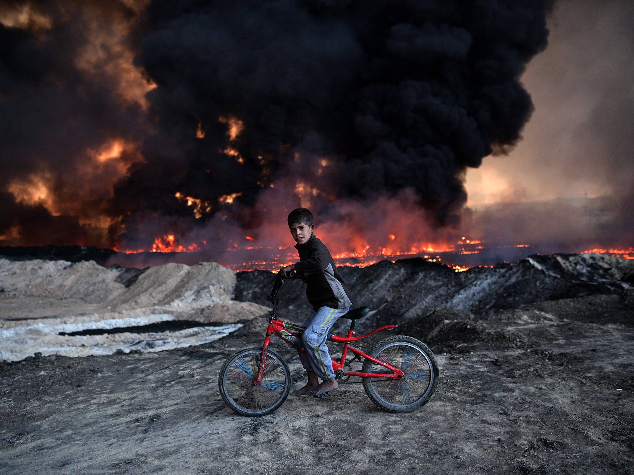 An oilfield burns ahead of the Mosul offensive in 2016