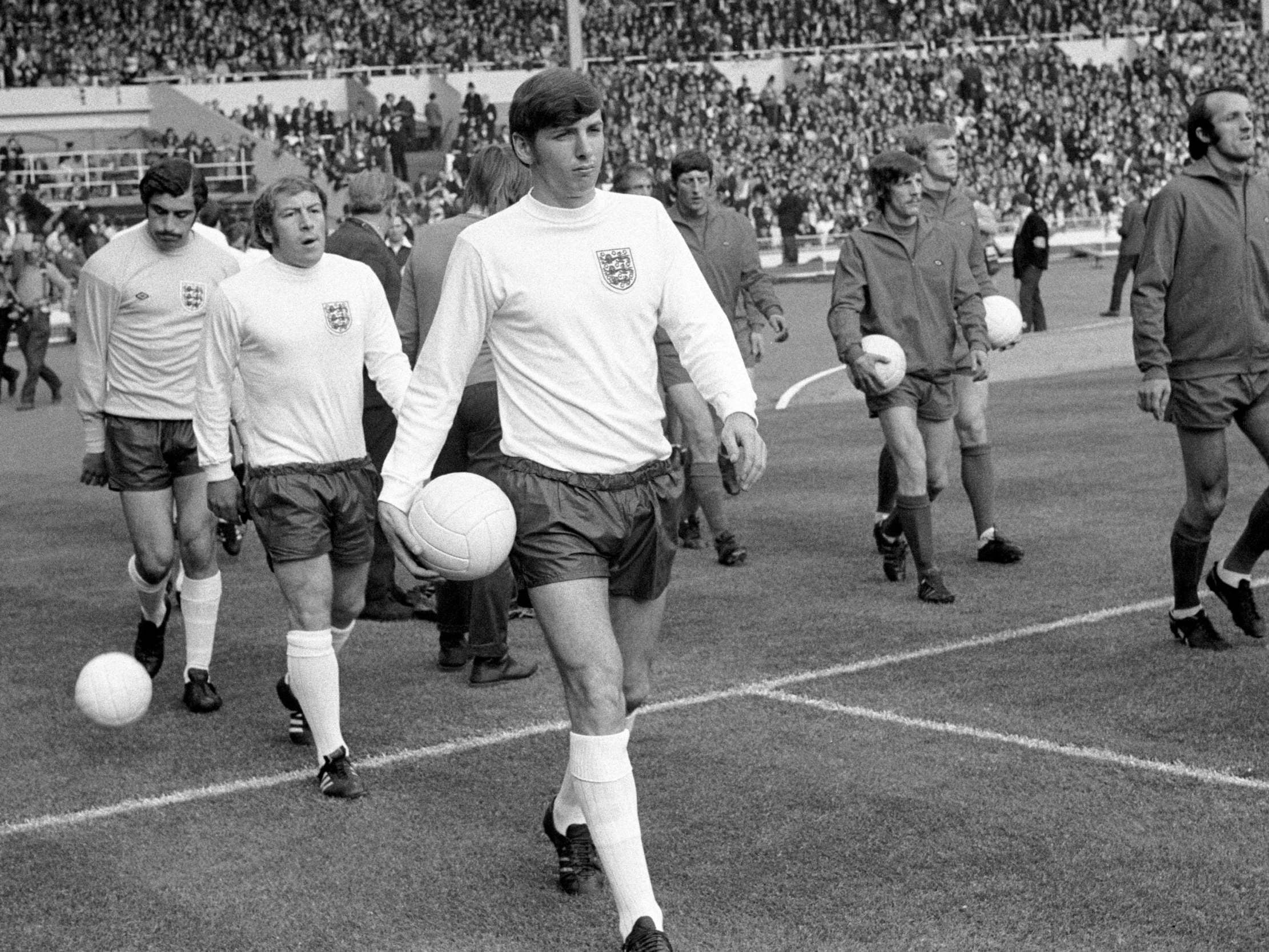 Martin Peters leads England out at Wembley for his first match as captain in May 1971