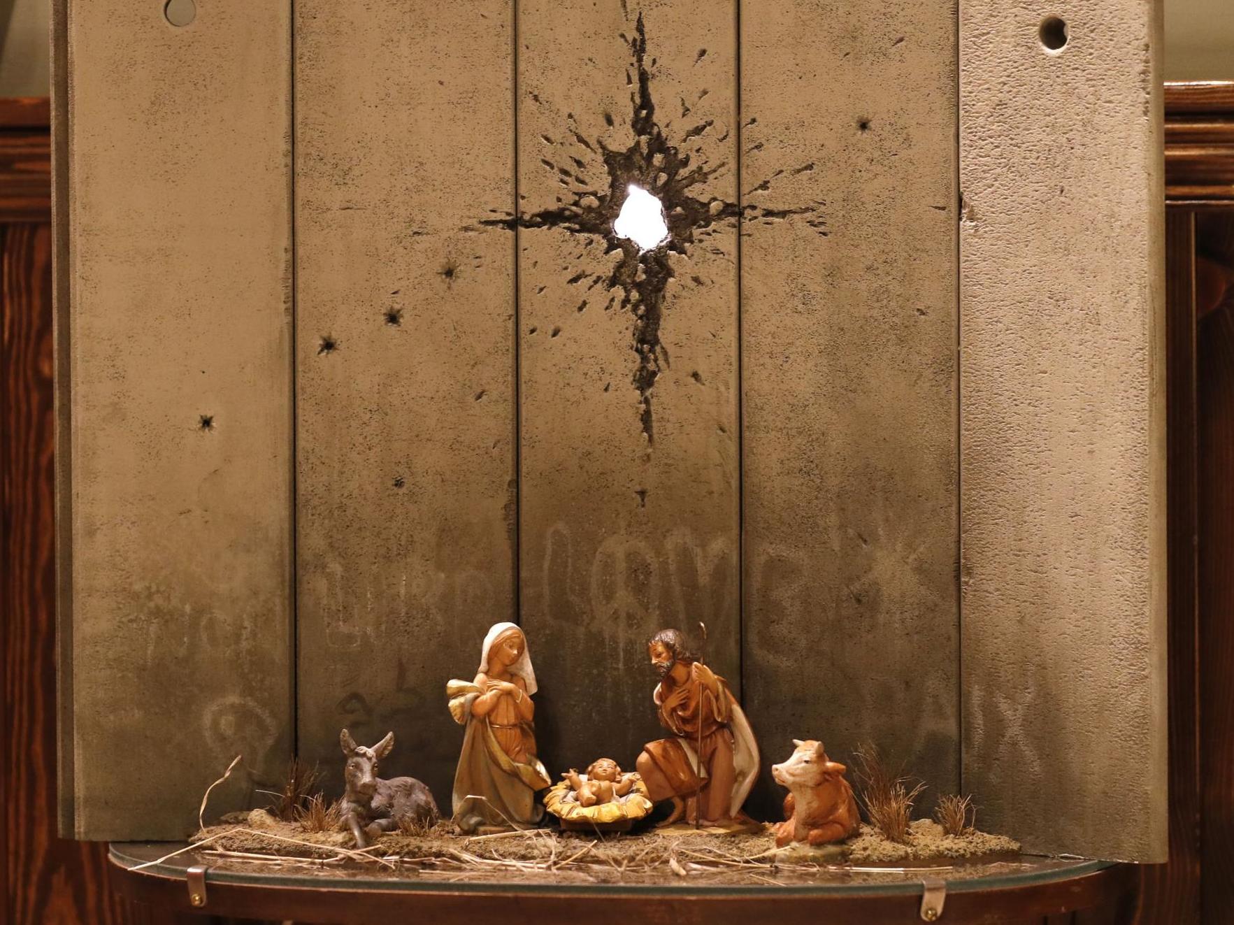 Banksy's new piece of work, titled "Scar of Bethlehem", at Walled-Off Hotel in Bethlehem in the occupied West Bank