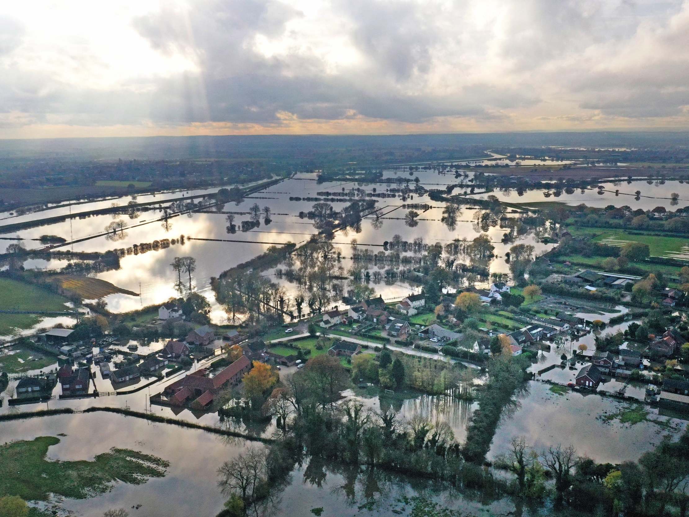 Boris Johnson has been urged to shore up flooding defences after the winter crisis that left villages like Fishlake under water