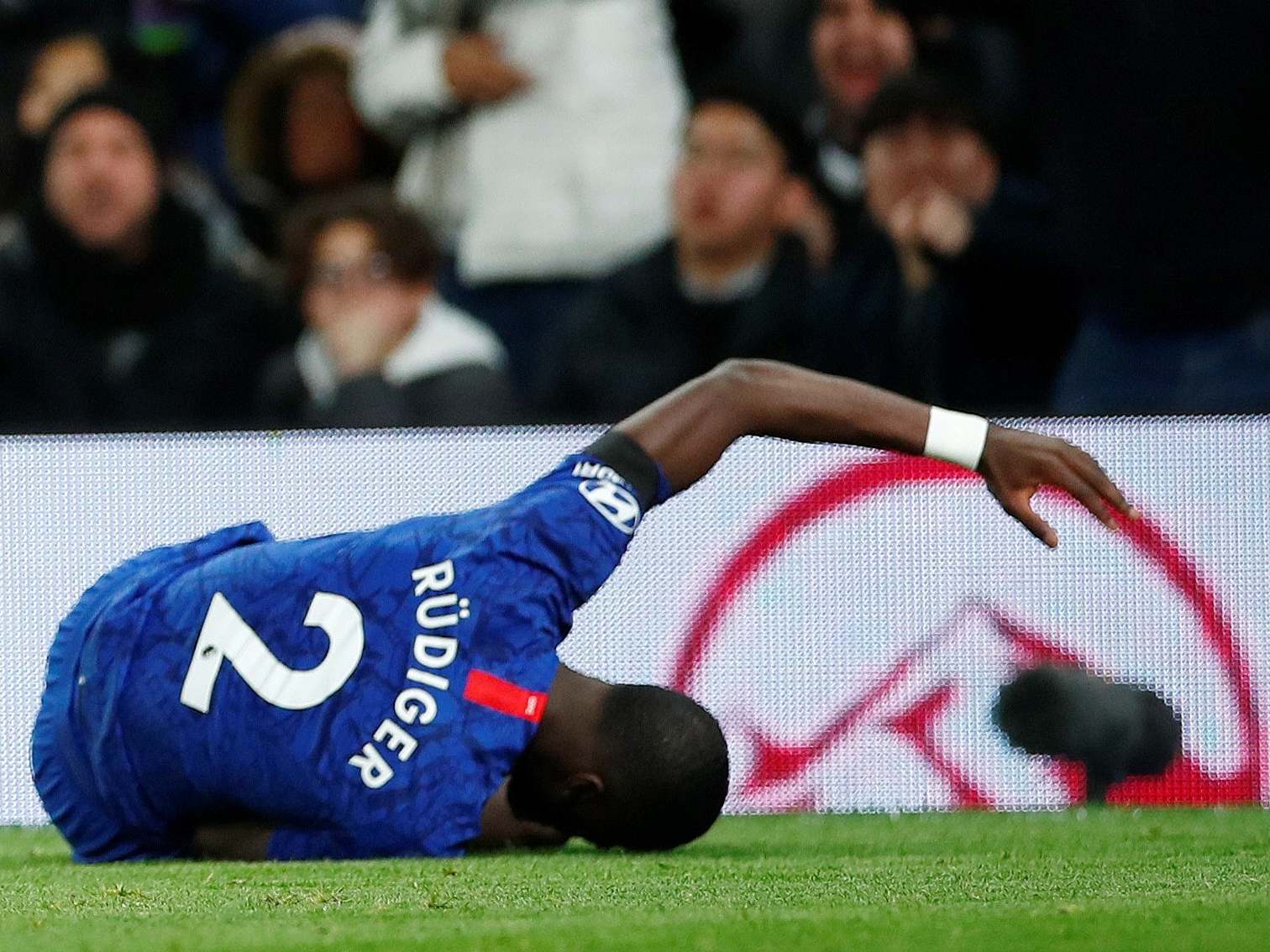 Antonio Rudiger reacts after being kicked by Son Heung-min