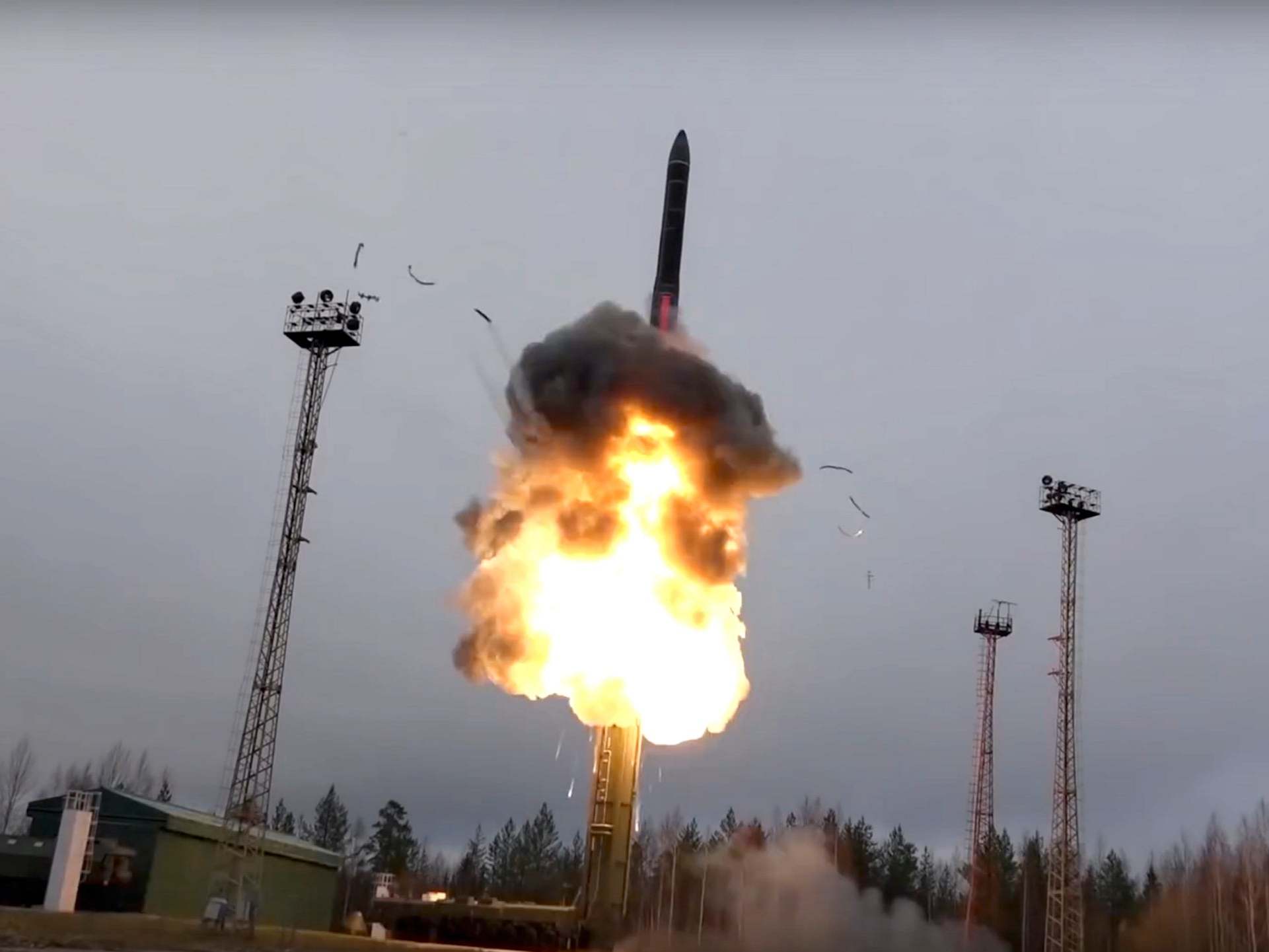 An intercontinental ballistic missile lifts off from a truck-mounted launcher in Russia