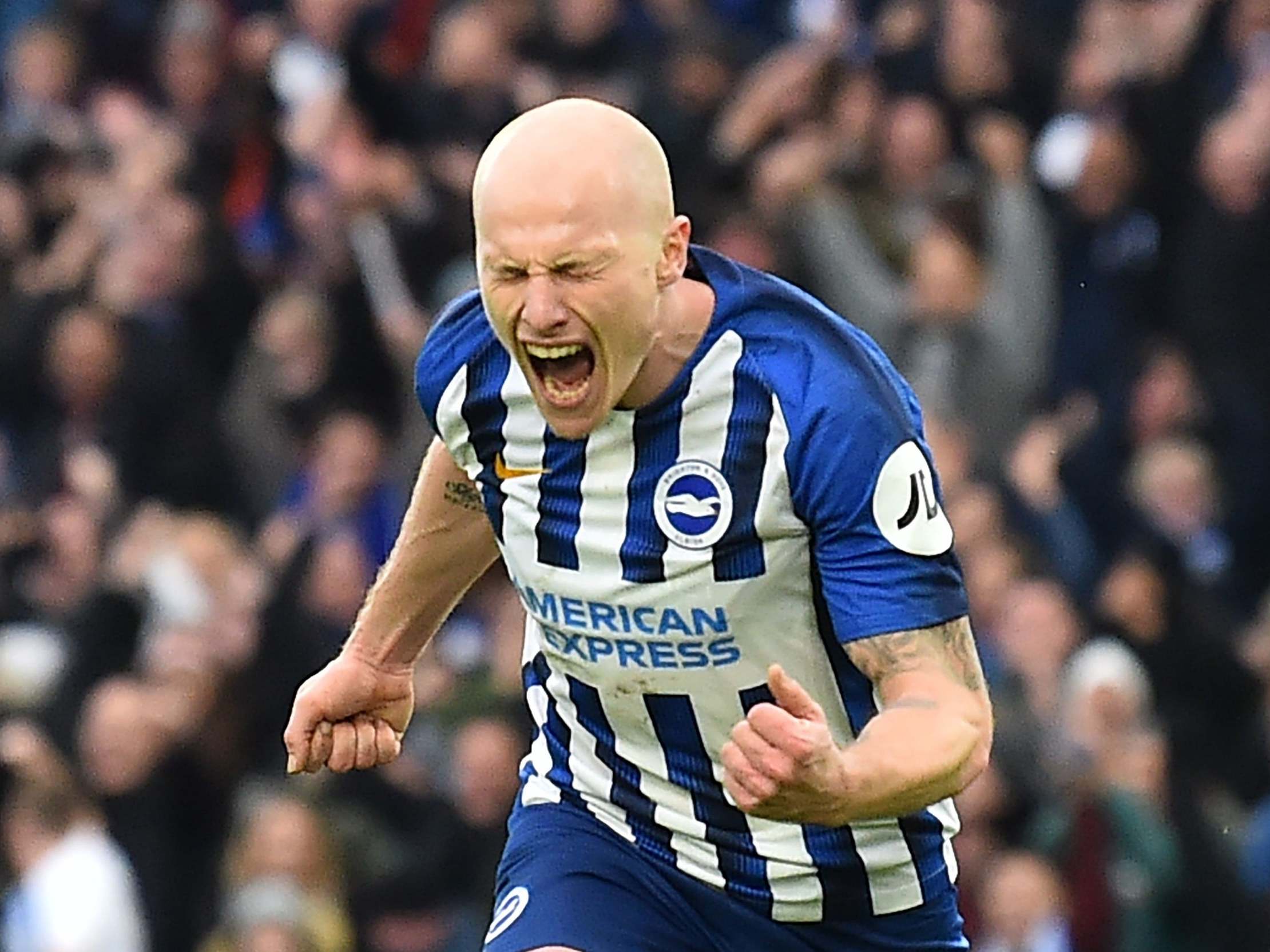 Aaron Mooy celebrates after scoring Brighton's second goal