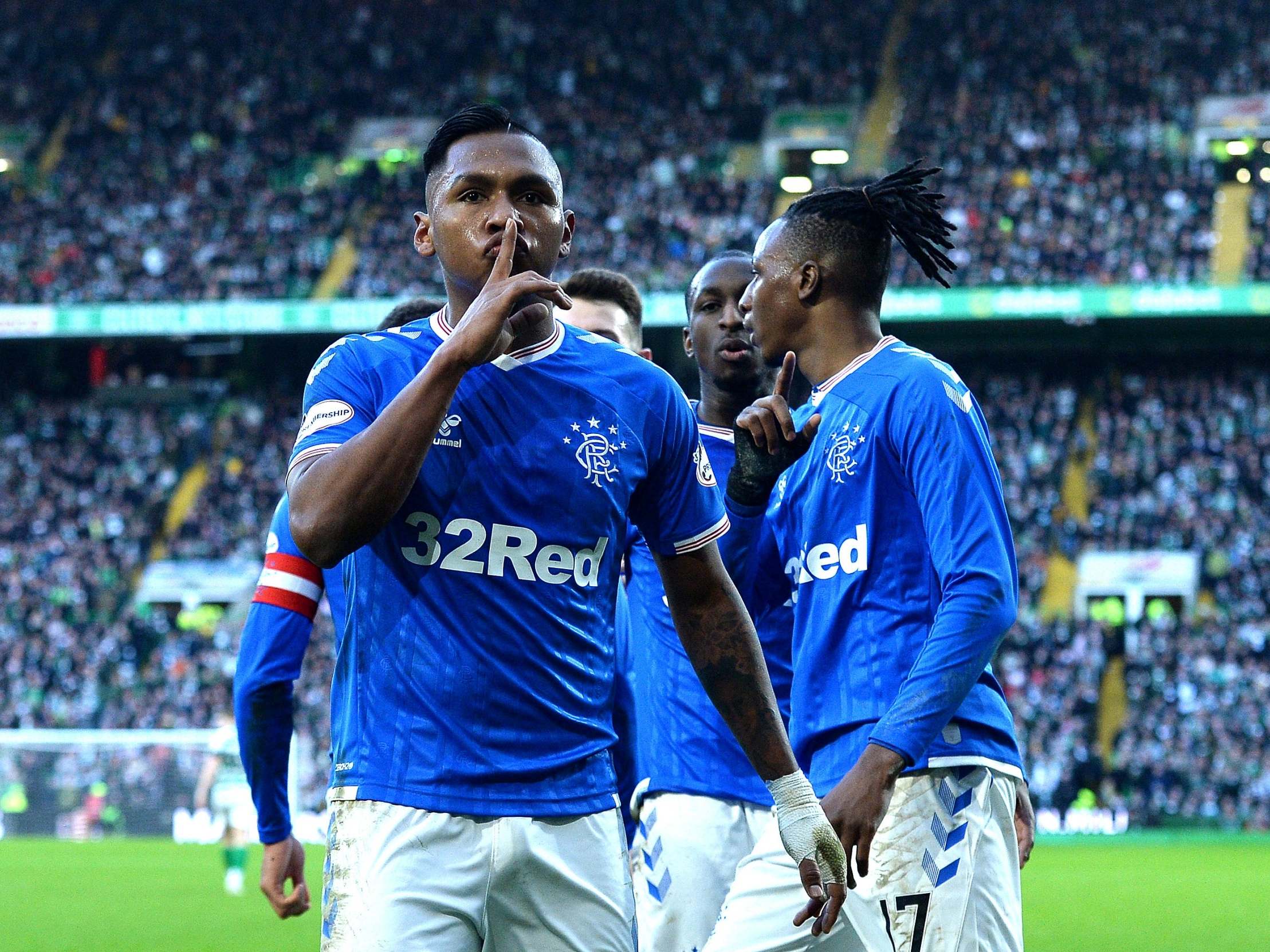 Teammate Alfredo Morelos celebrates teammate Ryan Kent's goal