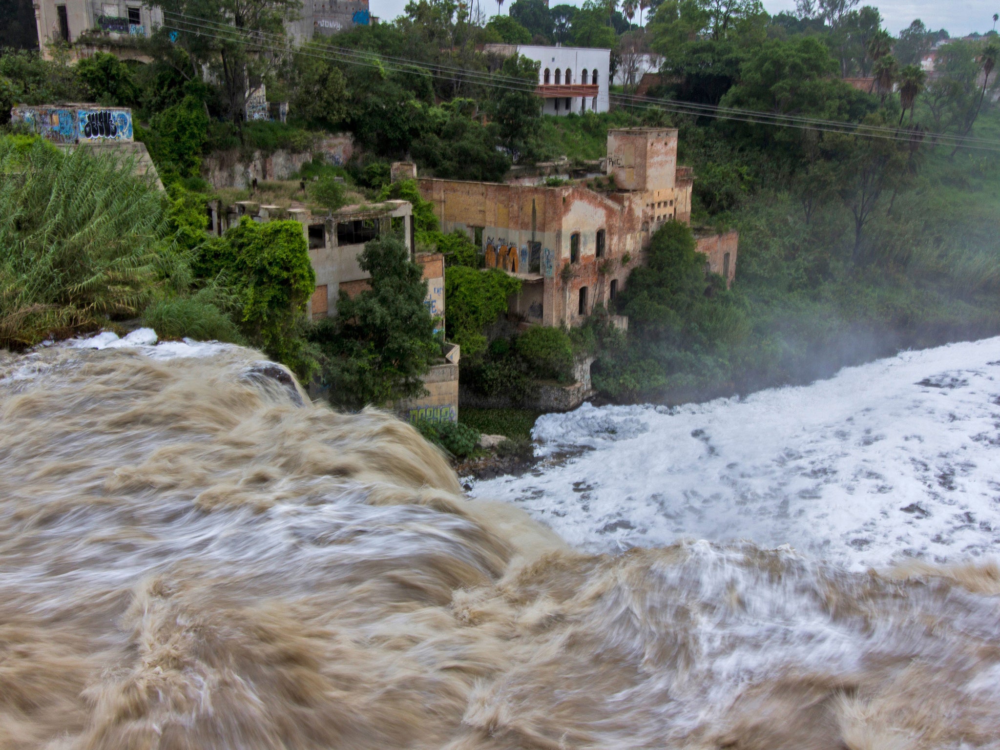 Residents living on the banks of the Santiago River believe pollution is responsible for many illnesses suffered, including cancer and kidney failure