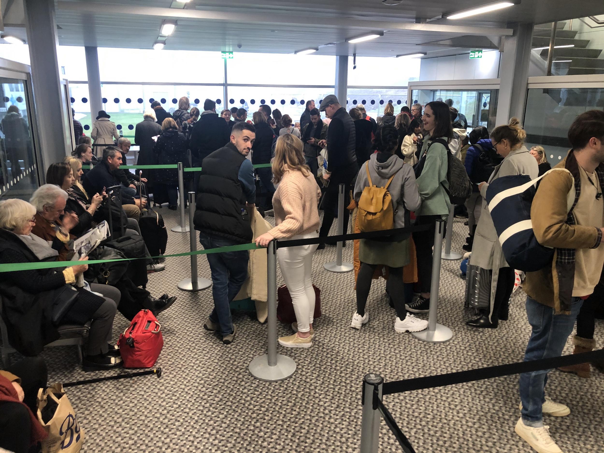 Oliver’s Army? Passengers queuing at Stansted airport, close to Jamie Oliver’s birthplace