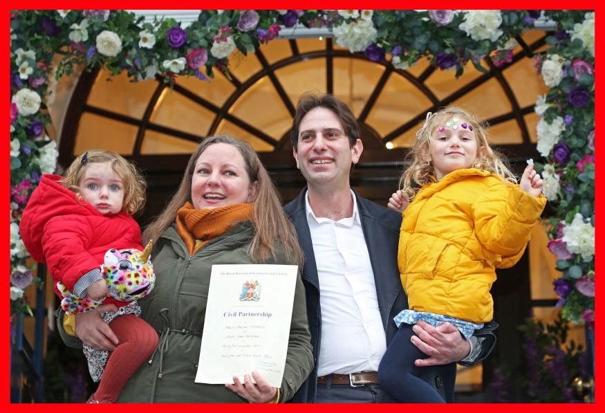 Rebecca Steinfeld and Charles Keidan, with their children Ariel and Eden, outside Kensington and Chelsea Register Office