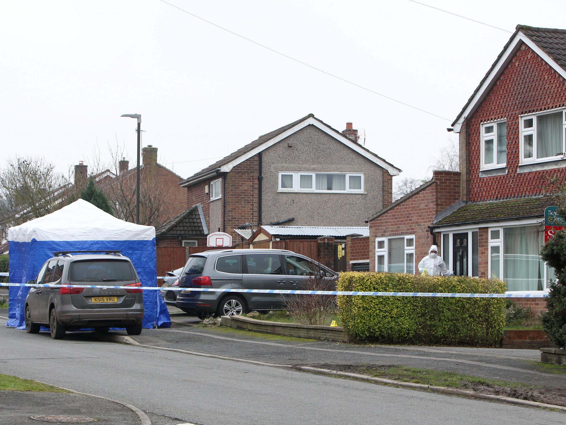 Police officers at the scene where a tent has been set up in New Zealand Lane (Anita Maric/SWNS)