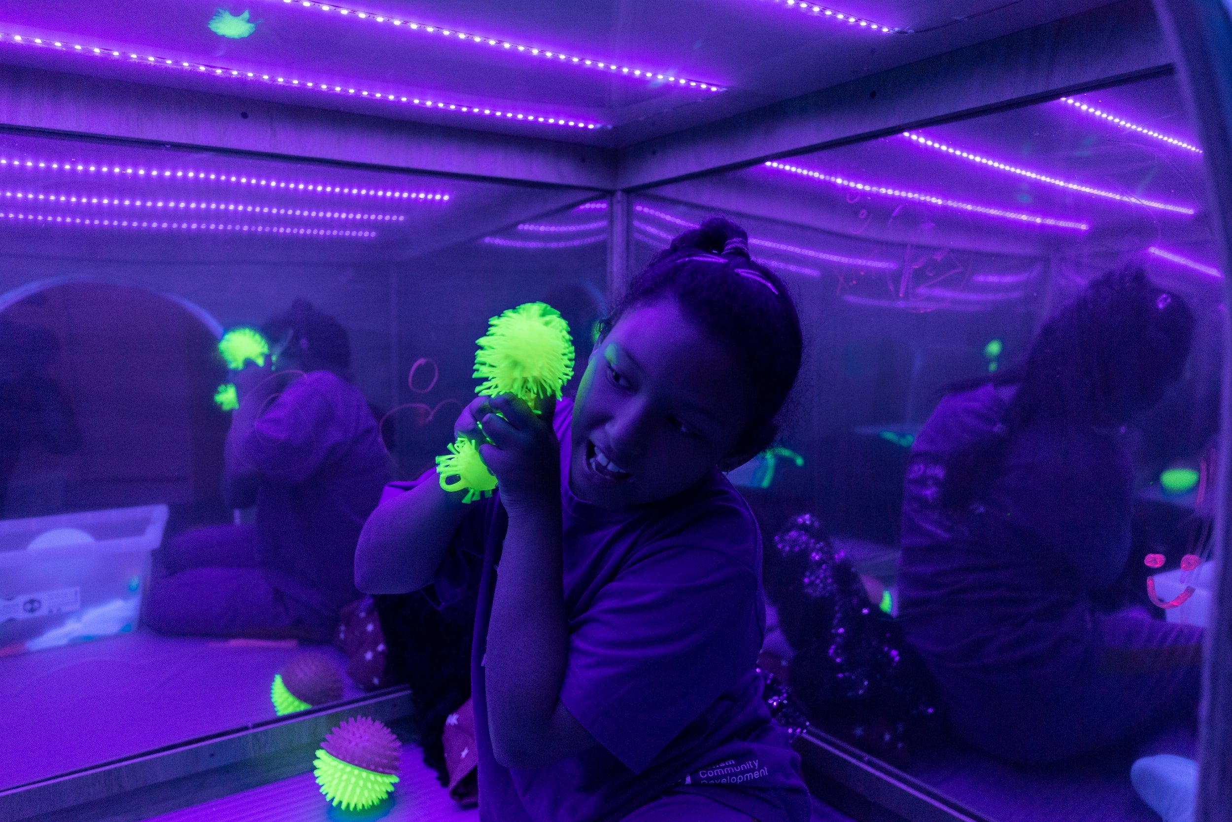 A girl interacts in a special sensory room. One out of every 59 children globally are diagnosed with some form of autism, and those affected often suffer from social anxiety and isolation