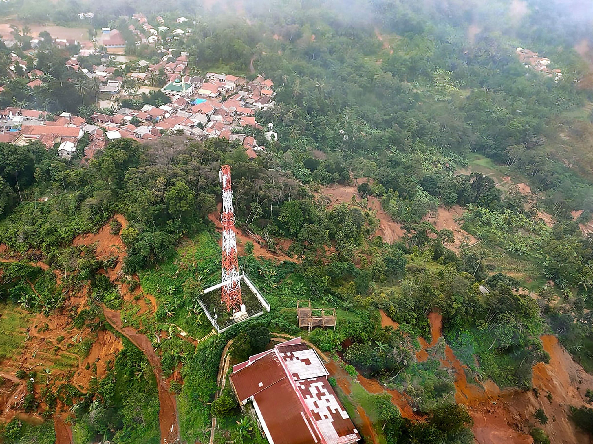 Aerial footage shows the effects of the disaster at at Pasir Madang village in Bogor