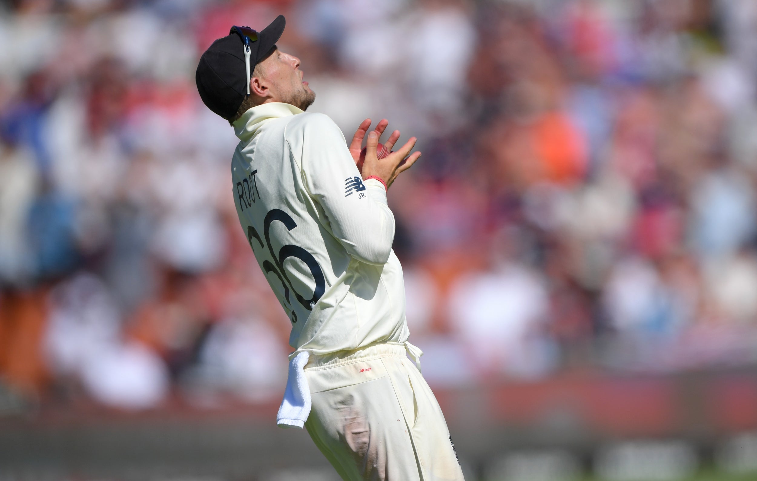 Joe Root clutches Elgar's sliced drive to dismiss the South African opener (Getty)