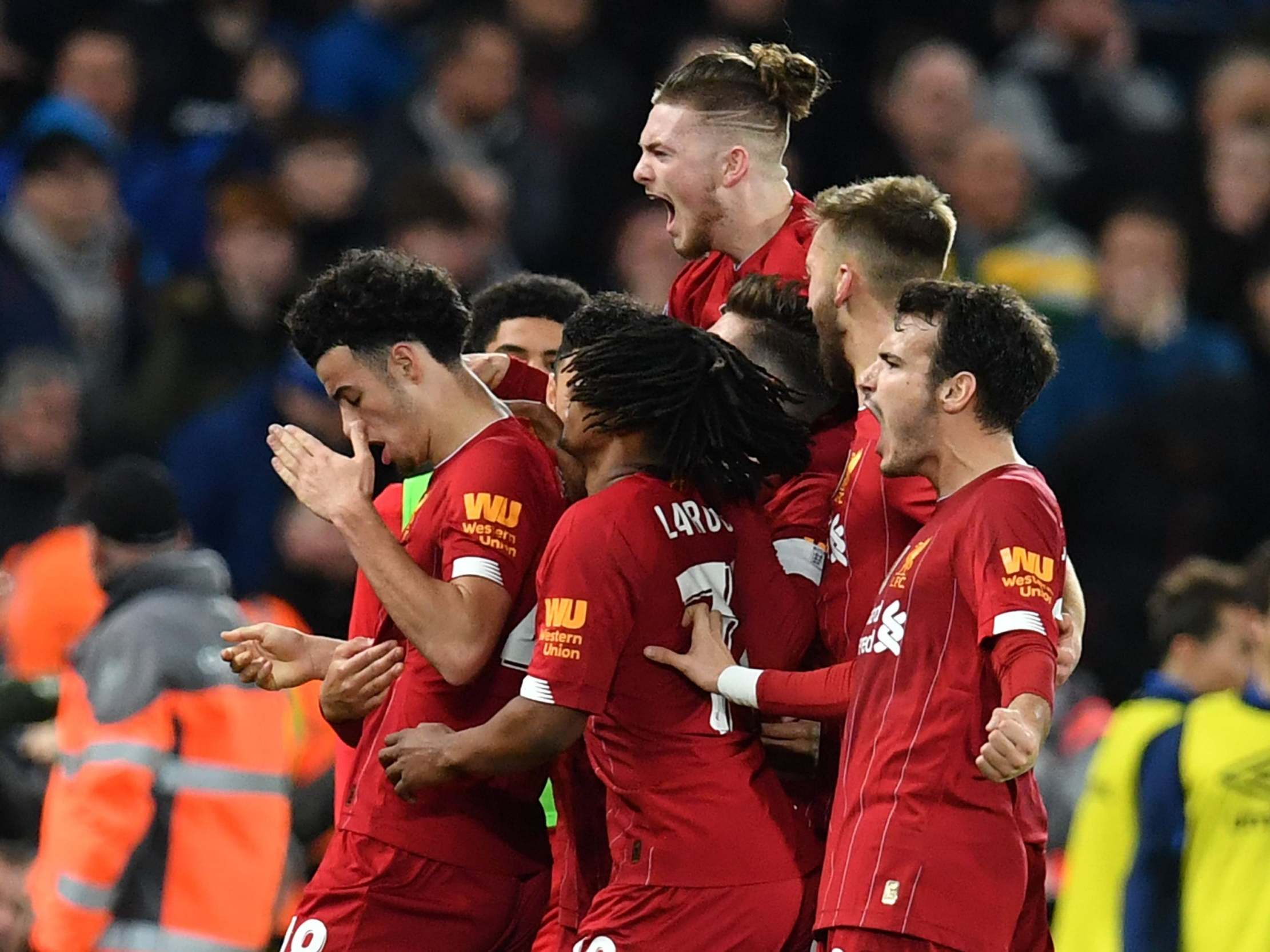 Liverpool's youthful side maintained their derby dominance over Everton