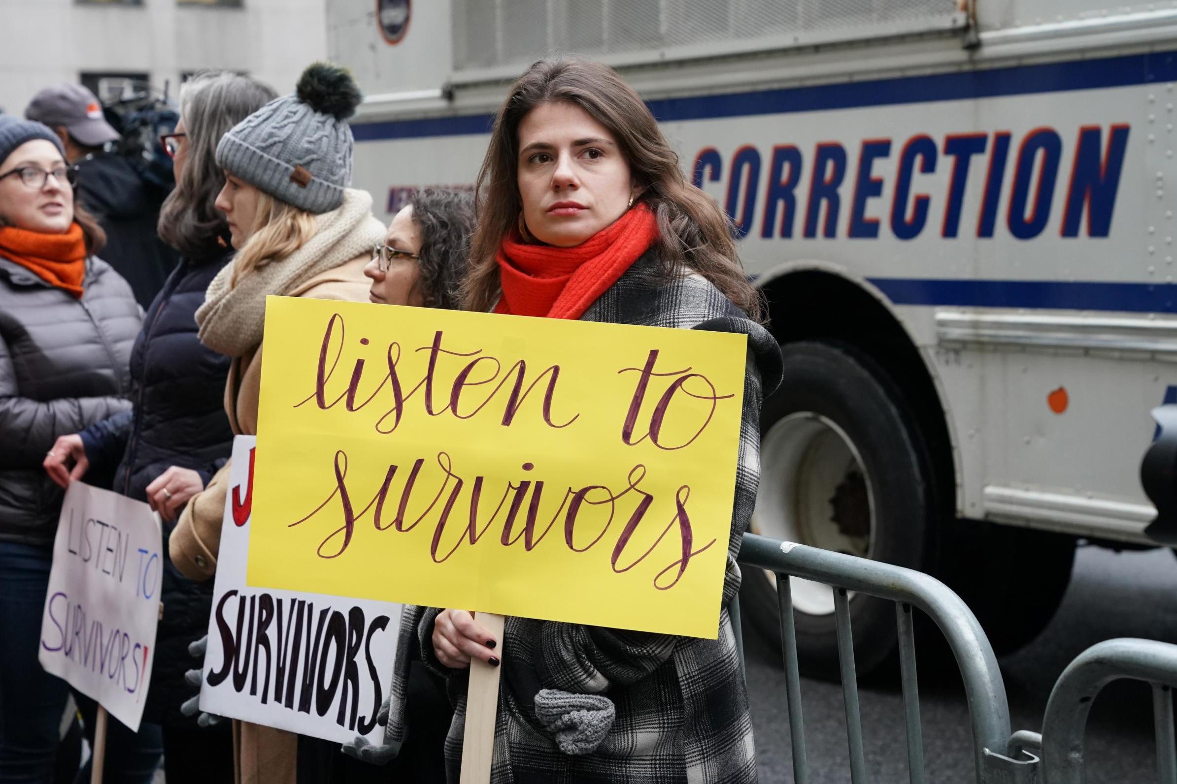 Demonstrators gather outside the courthouse before the arrival of Harvey Weinstein at the State Supreme Court in Manhattan on 6 January, the first day of his criminal trial