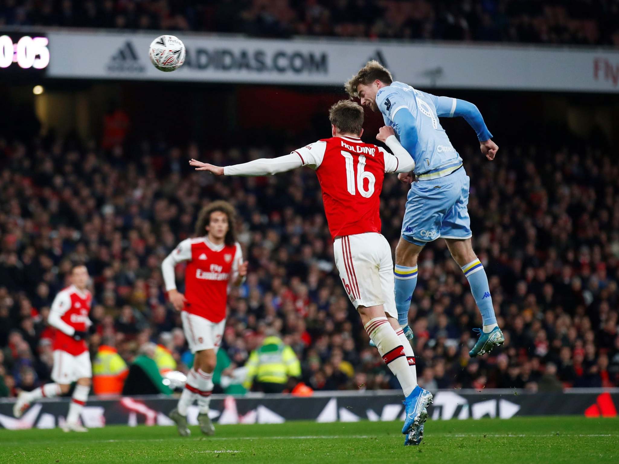 Patrick Bamford beats Rob Holding in the air