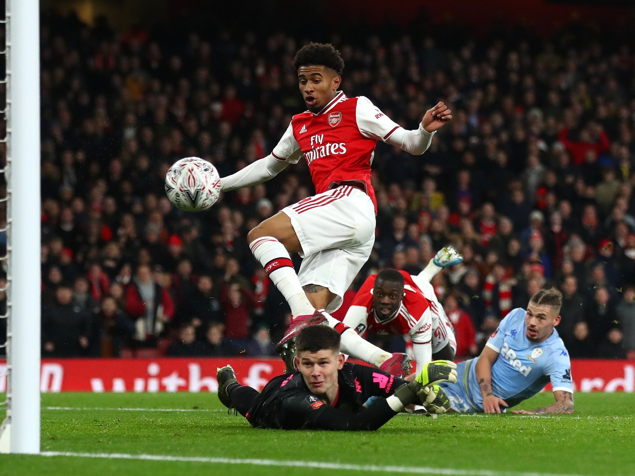 Reiss Nelson knocks home the winning goal