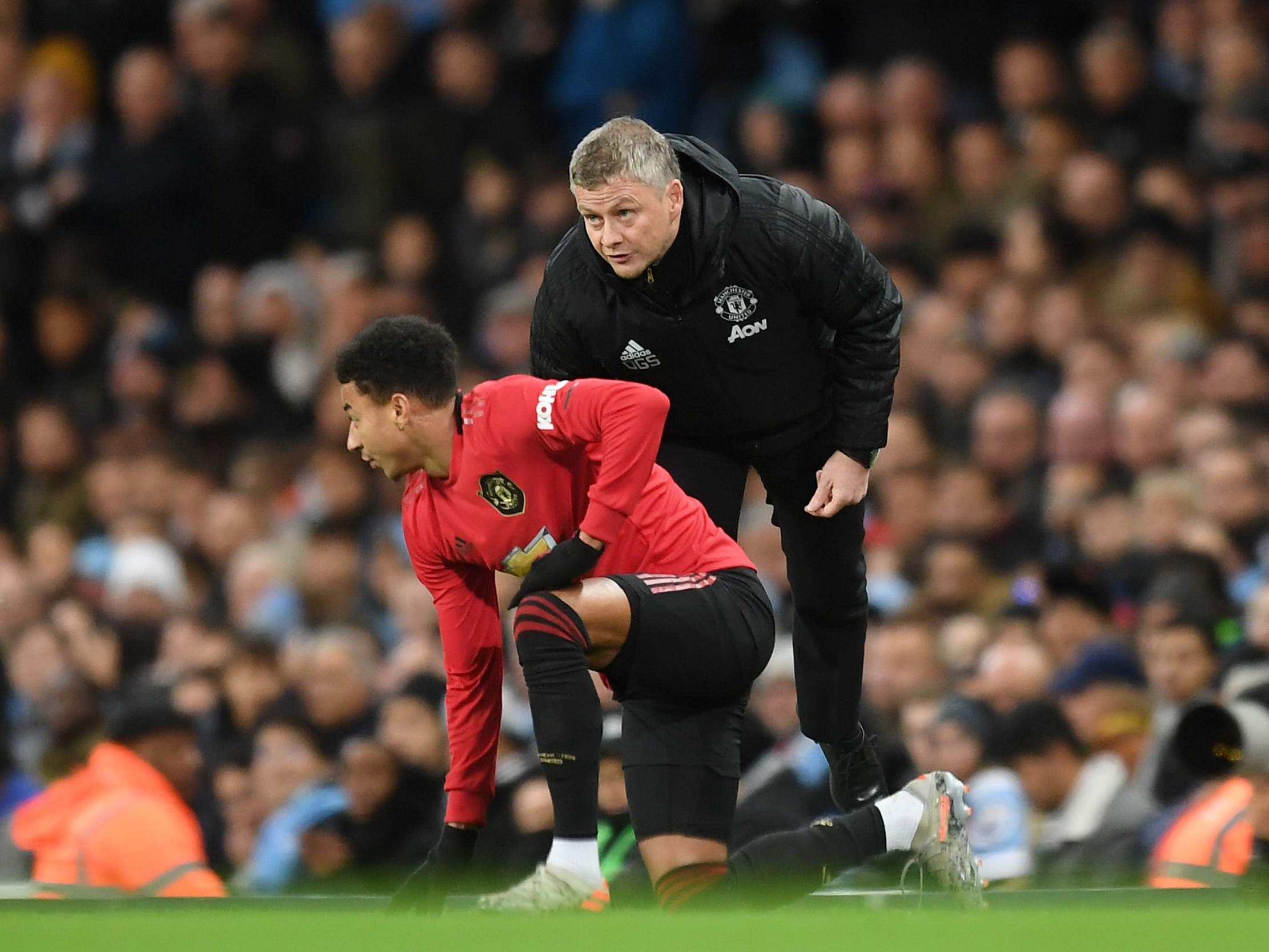 Ole Gunnar Solskjaer instructs Jesse Lingard during December's Manchester derby