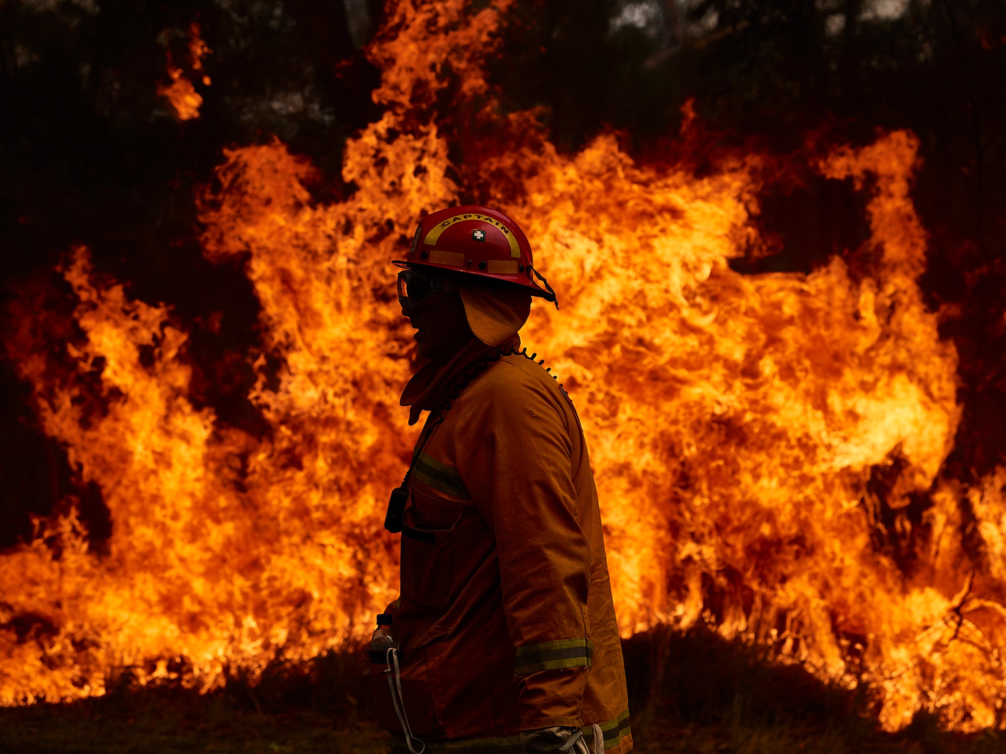 A CFA Member works on controlled back burns along Putty Road