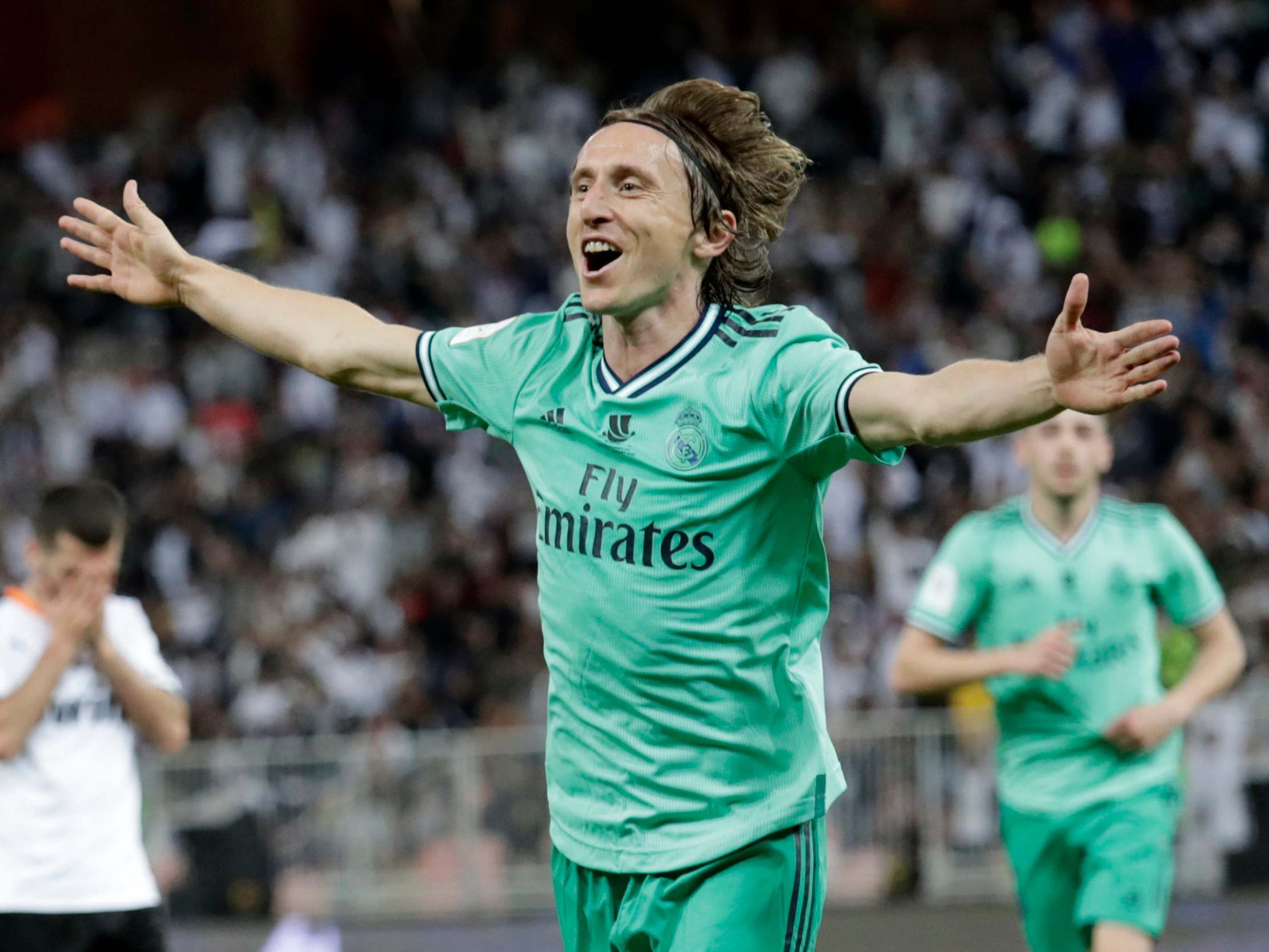 Luka Modric celebrates his long-range strike